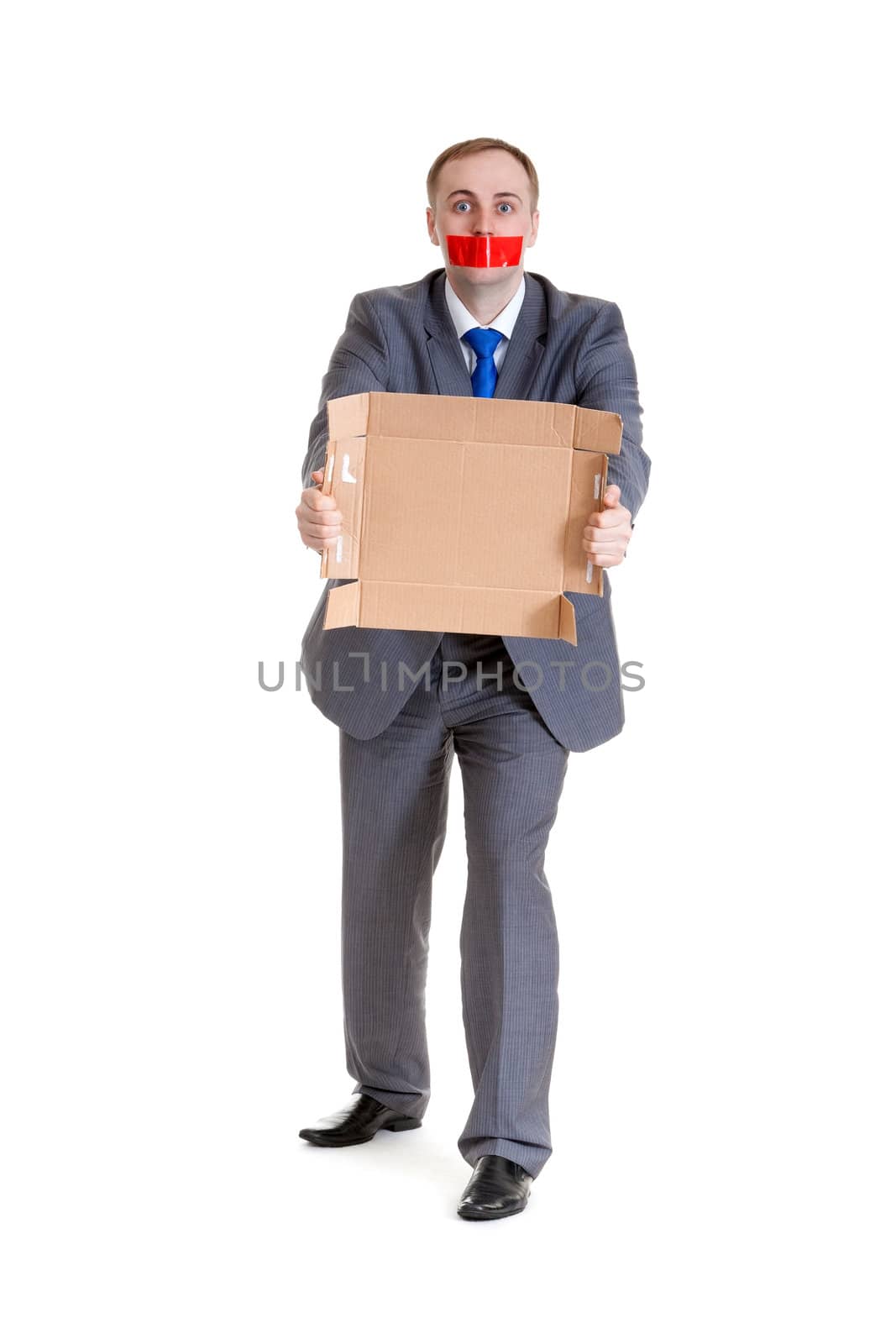 Businessman with his mouth sealed with red tape and cardboard in their hands