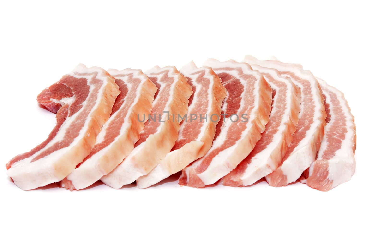 Chunks of raw meat on a white background