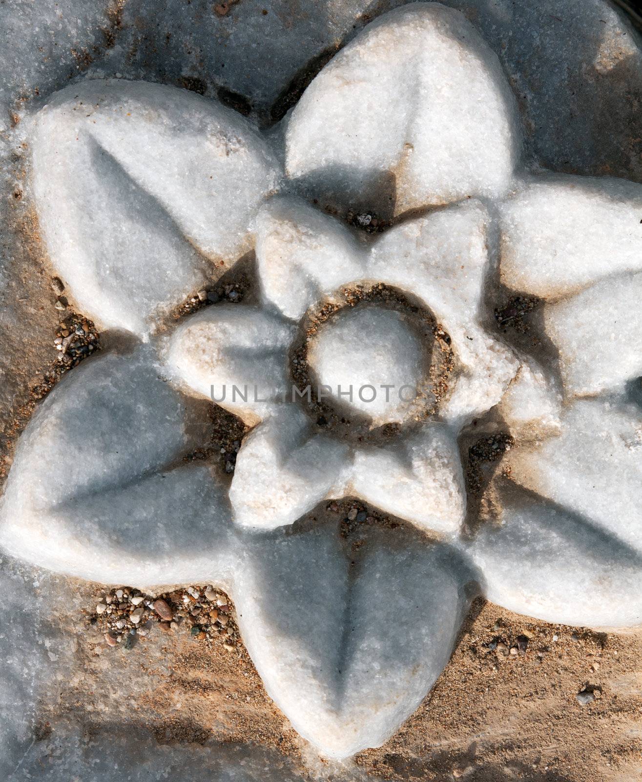 Carved patterns in the old white marble