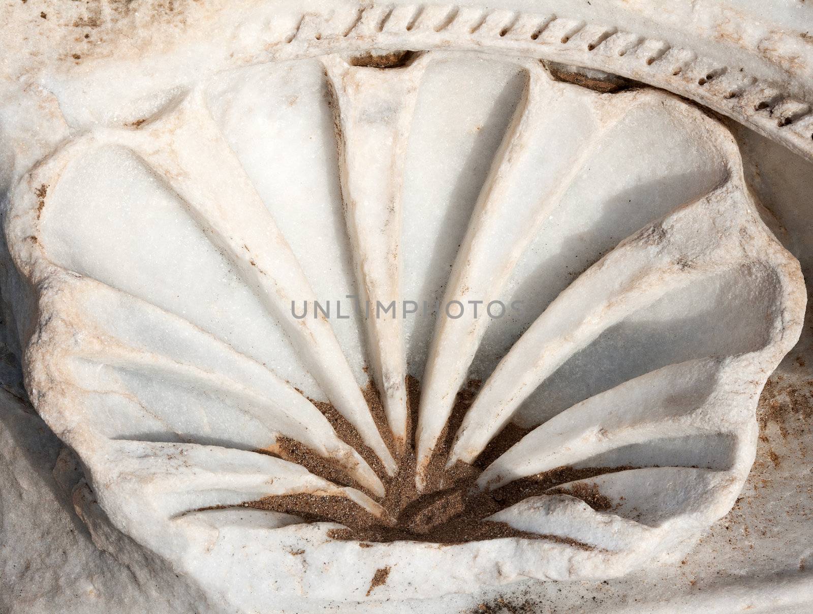 Carved patterns in the old white marble