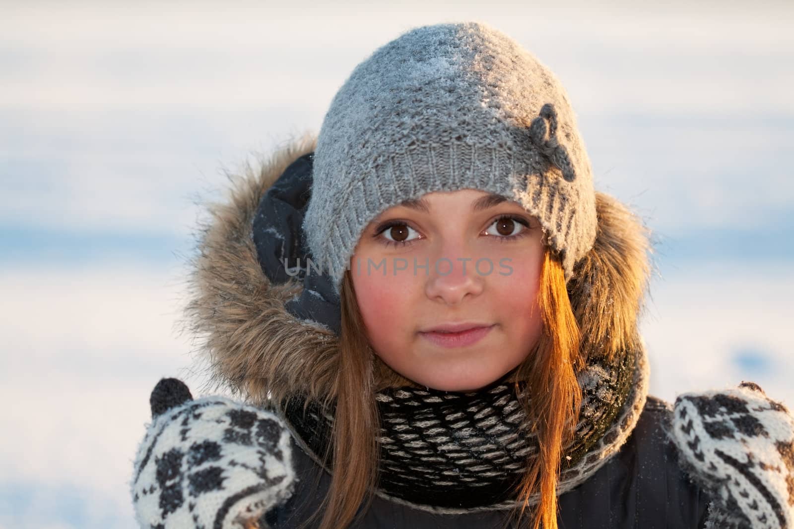 portrait of a young beautiful girl in the cold