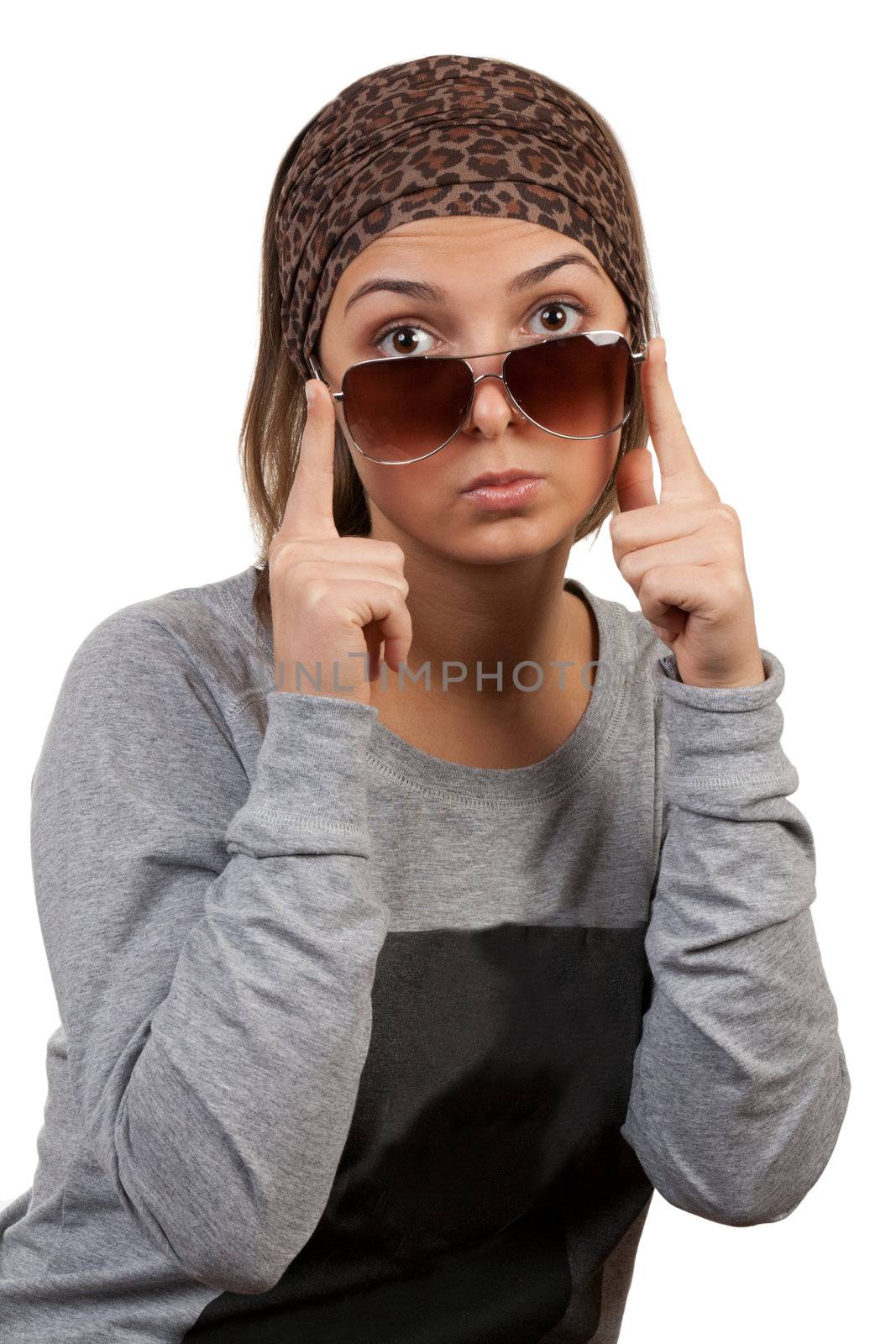 portrait of a girl with glasses in a leopard scarf on a white background