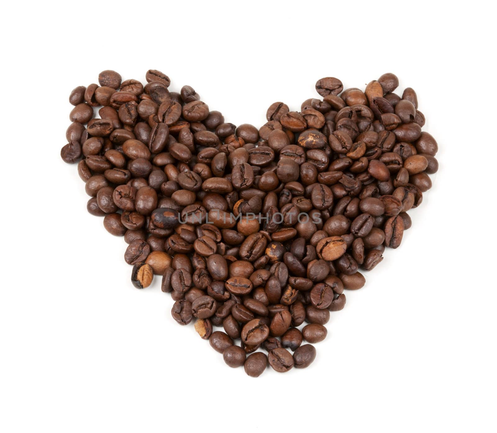 beans ulodennye in shape of heart on a white background