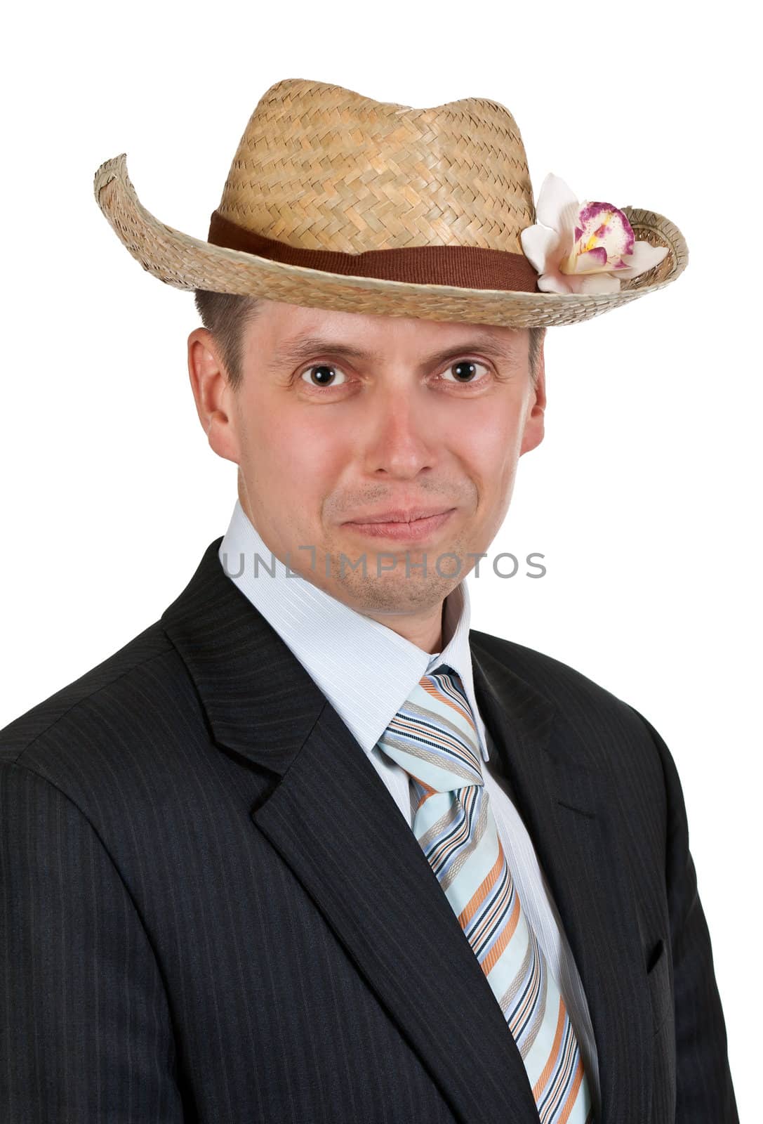 Handsome businessman with a straw hat with an orchid on a white background