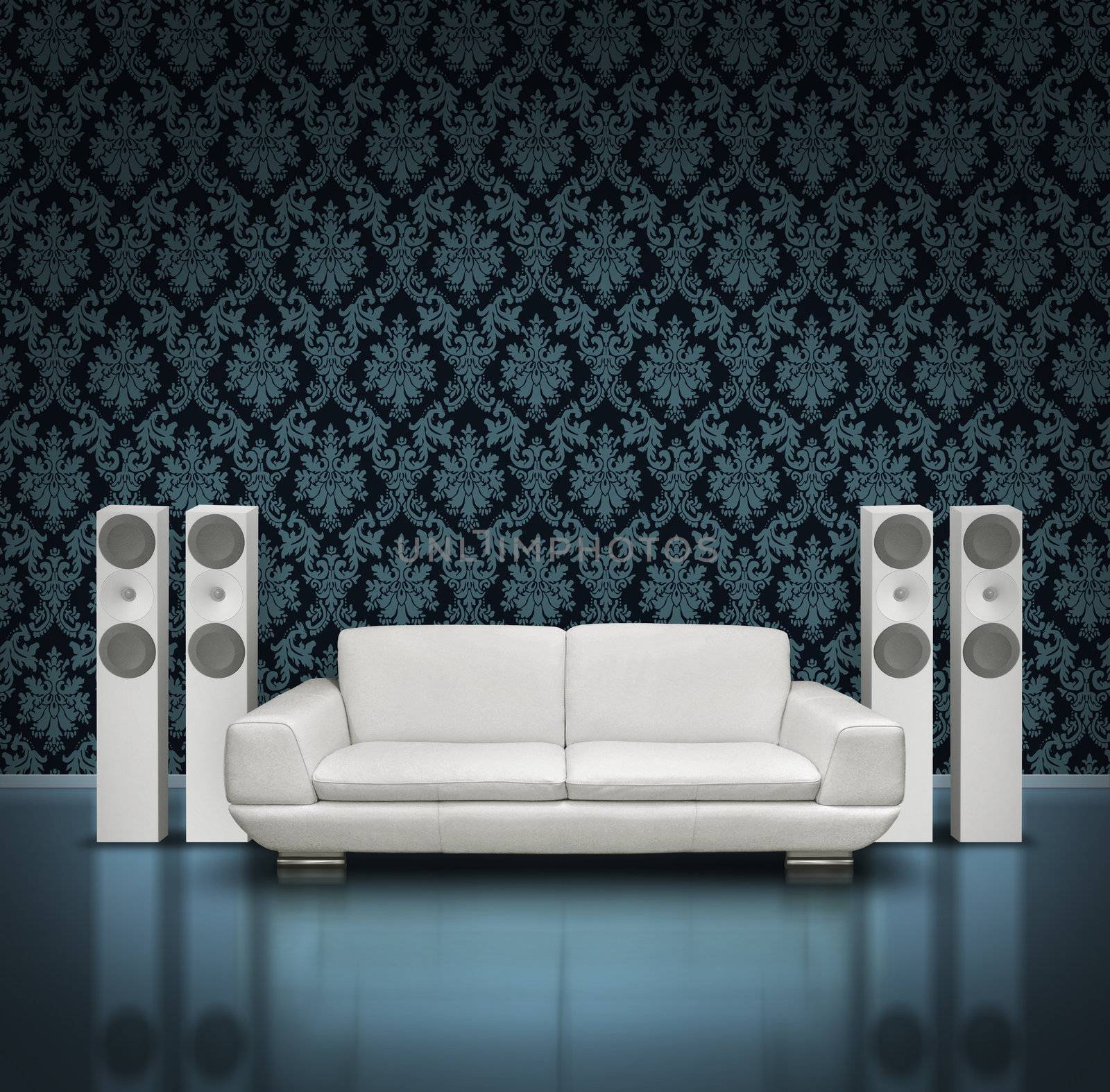 Dark blue listening room with white speakers and sofa