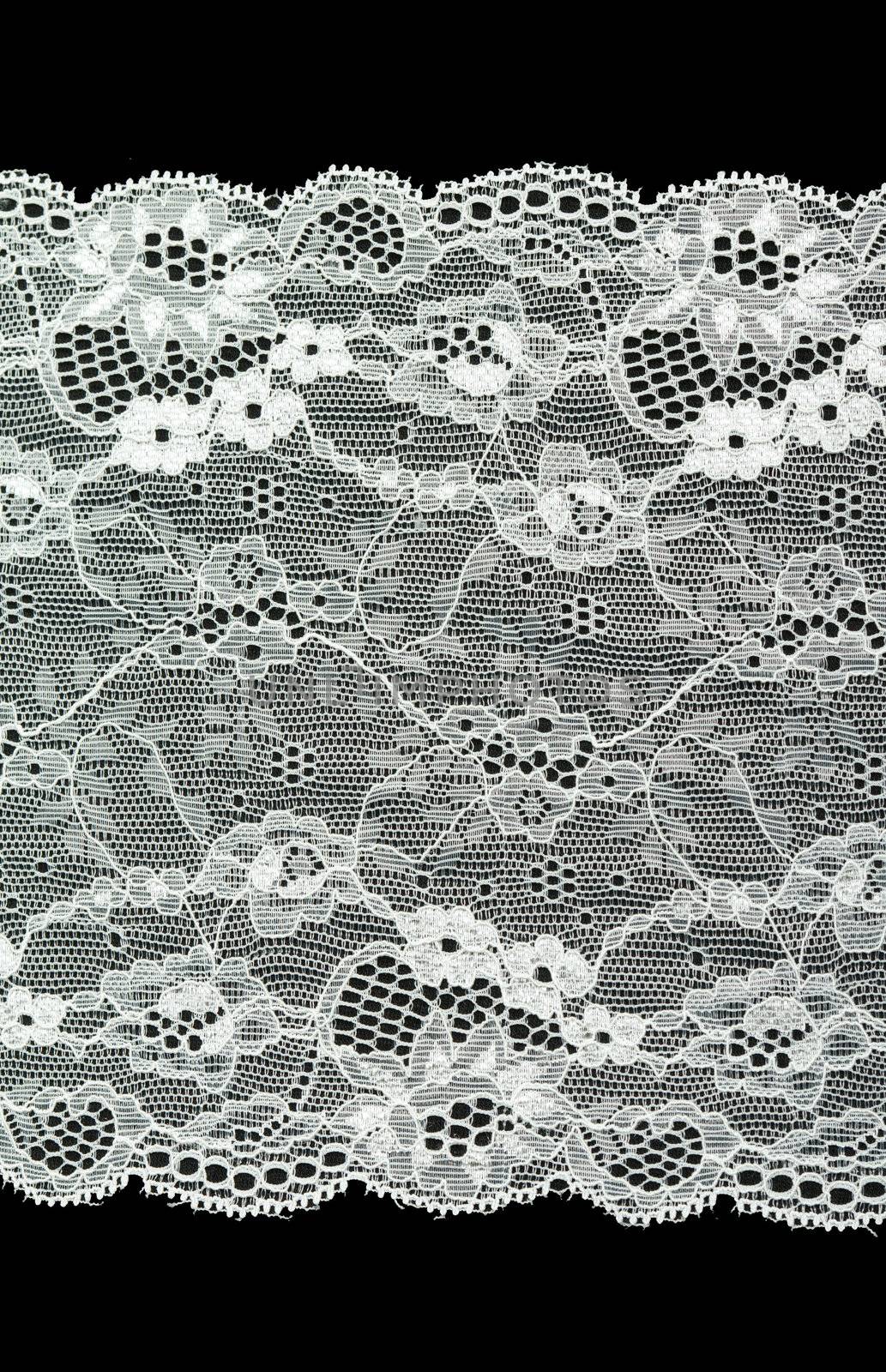 White lace with pattern with form flower on black background