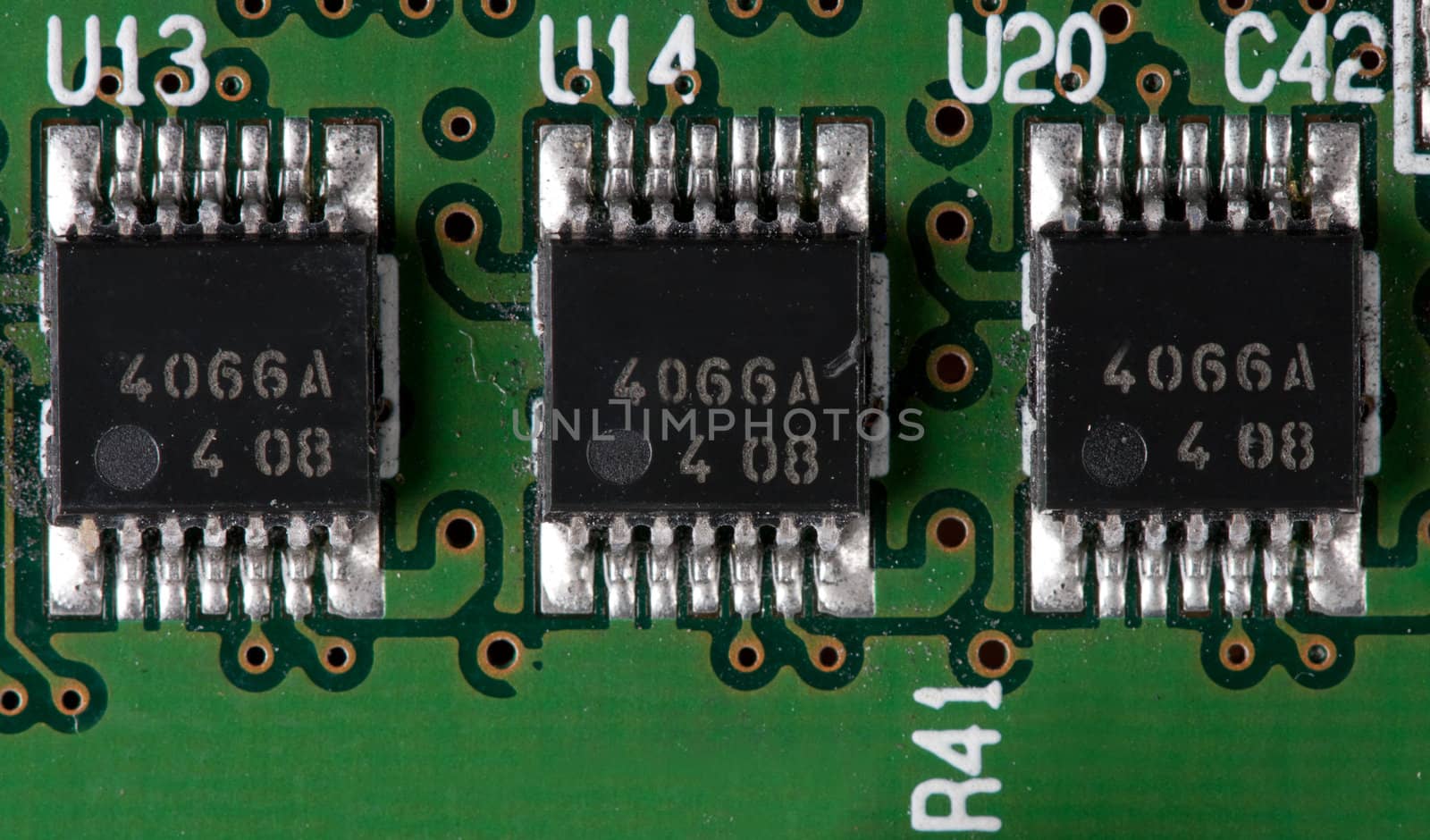chips on a green printed electronic board