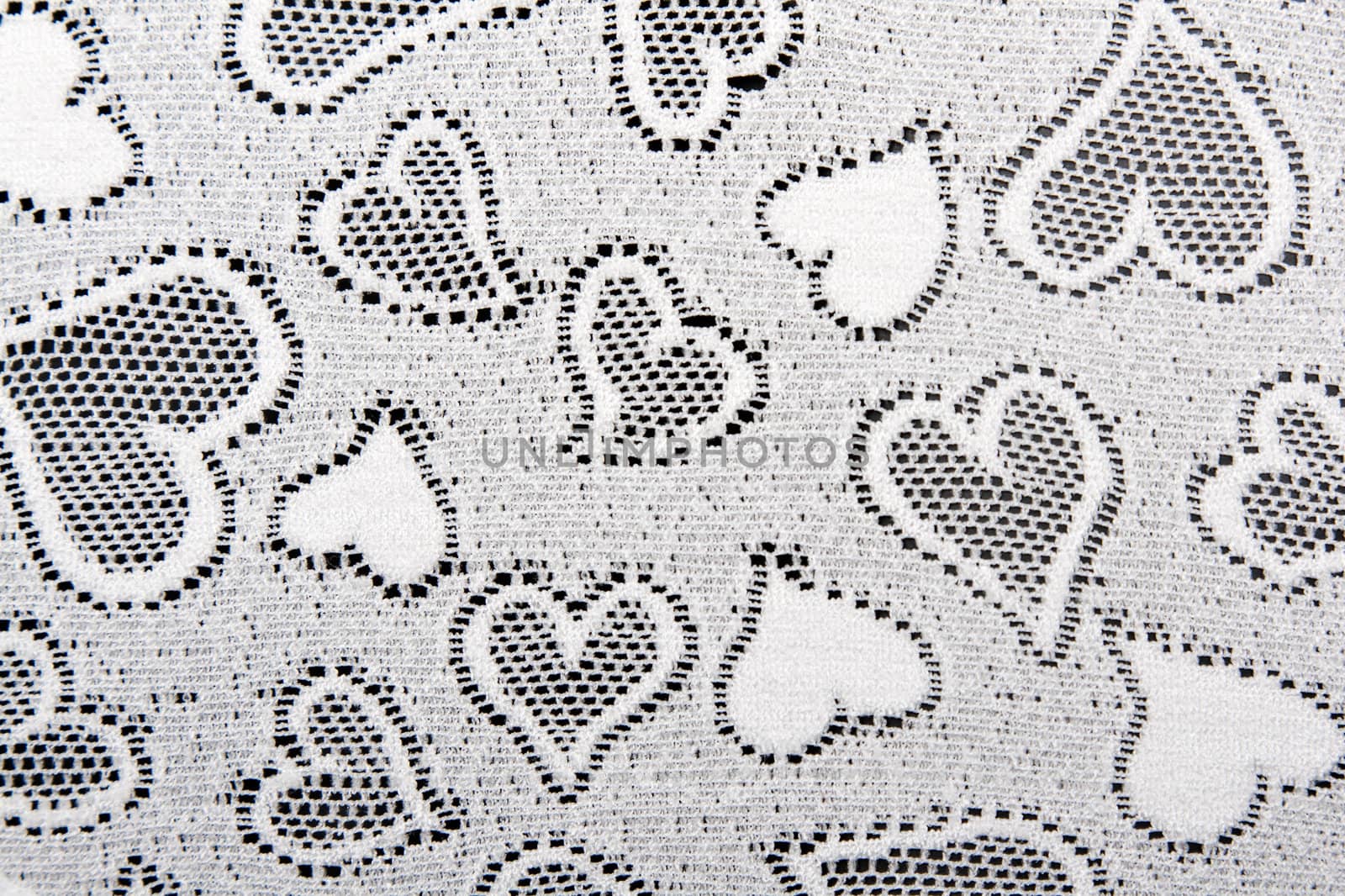 white lace patterned with hearts background