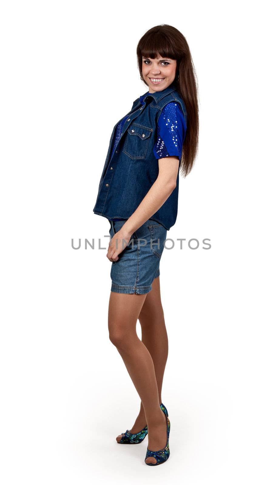 girl in denim shorts on a white background