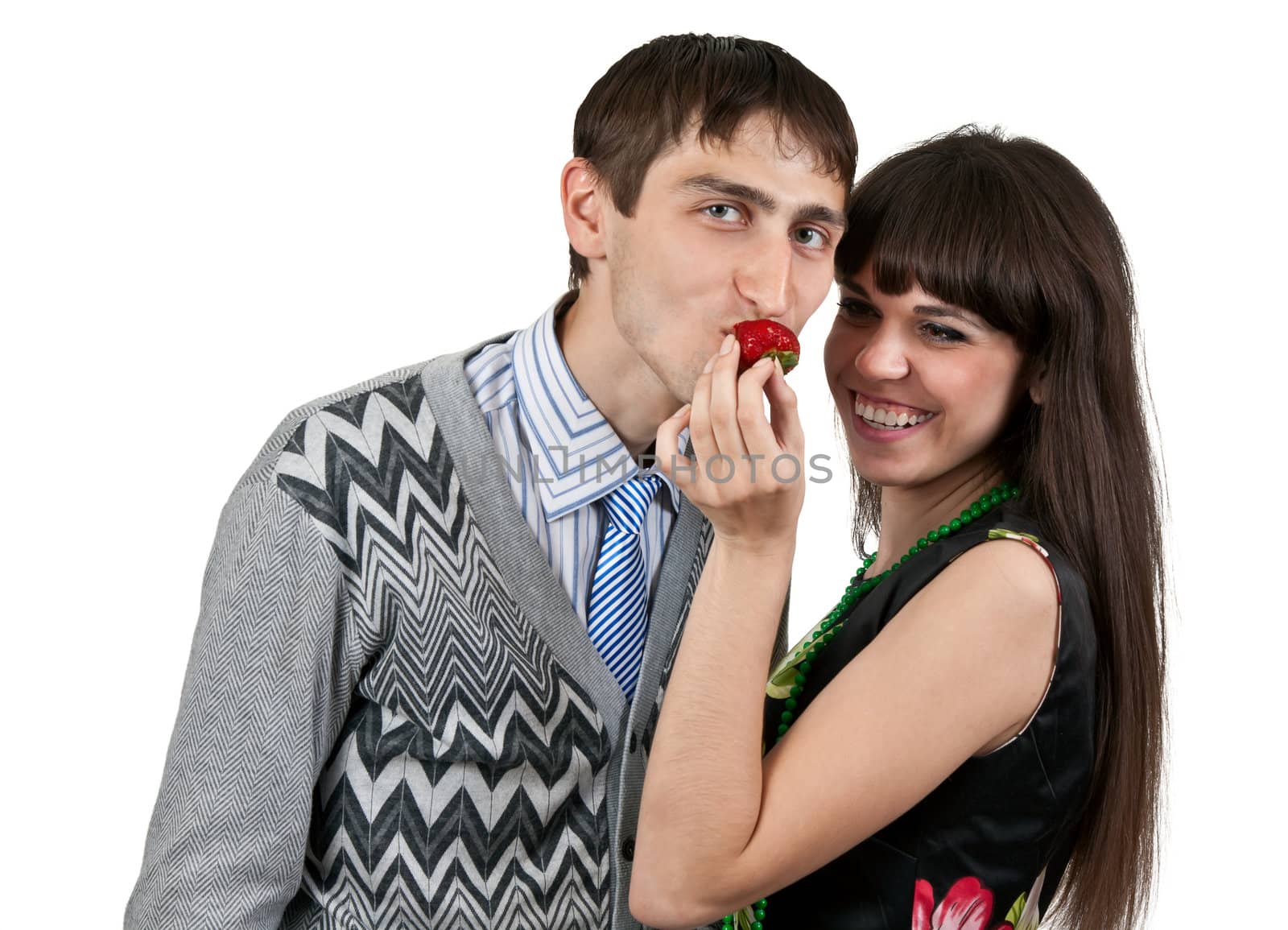woman feeding man strawberries by RuslanOmega