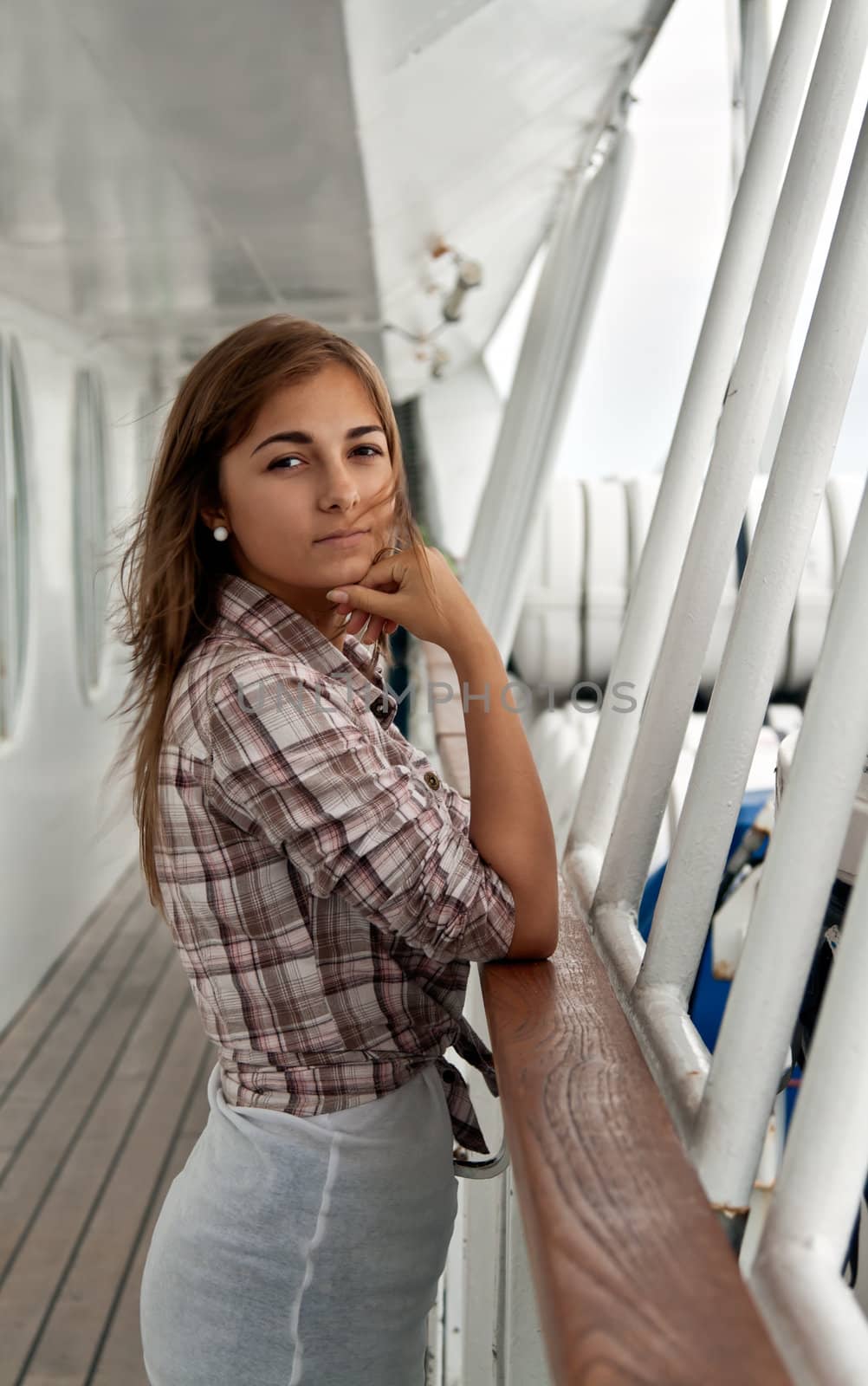 portrait of a girl on the deck of the ship White