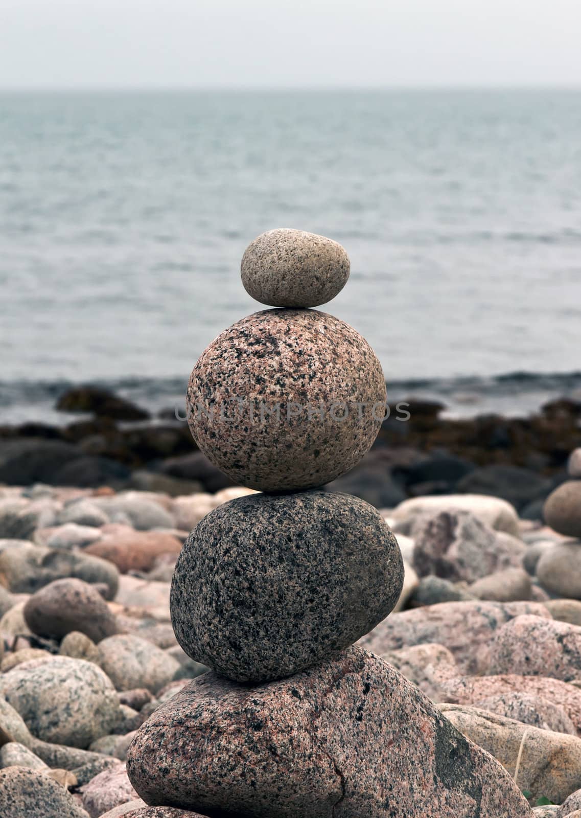 round stones on the beach, piles
