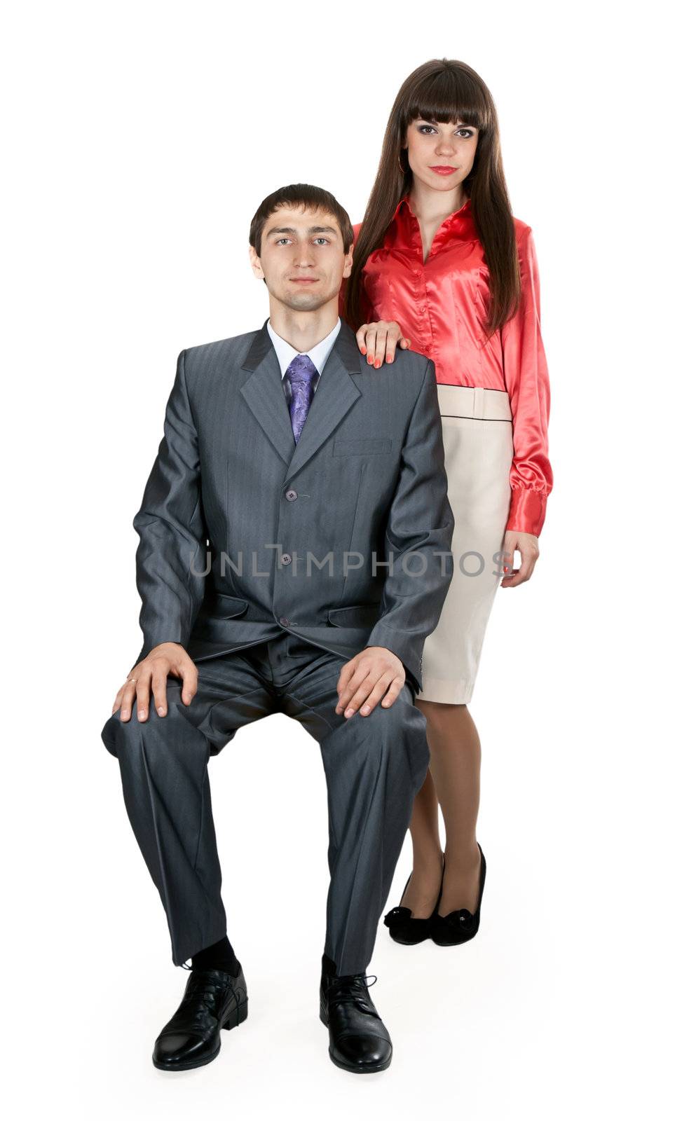 married couple in business attire in the studio on a white background in retro style