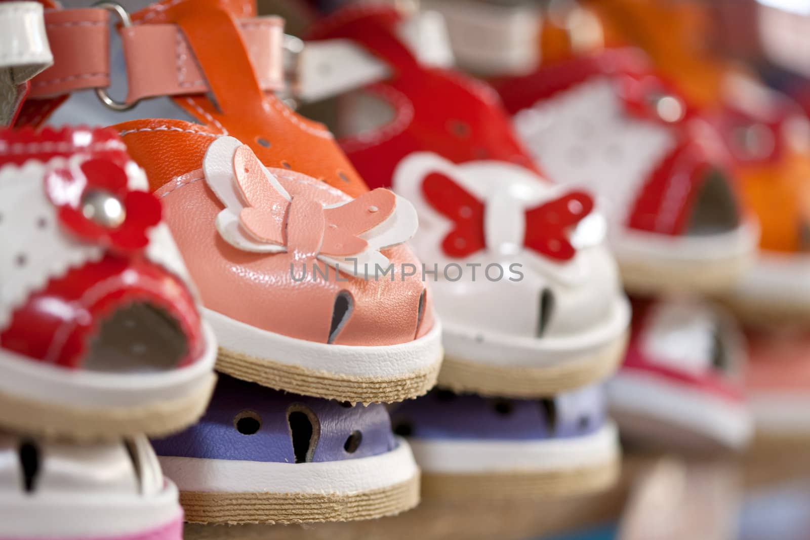colorful children's shoes are in line with the shallow depth of field