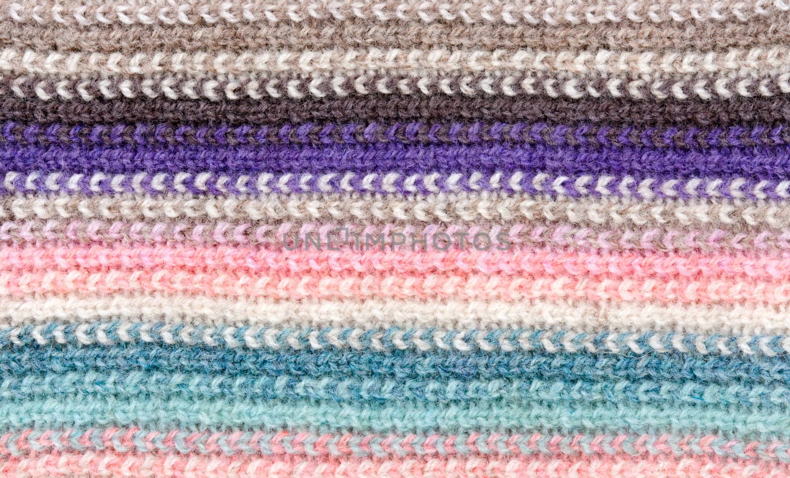 knitted striped colored background.