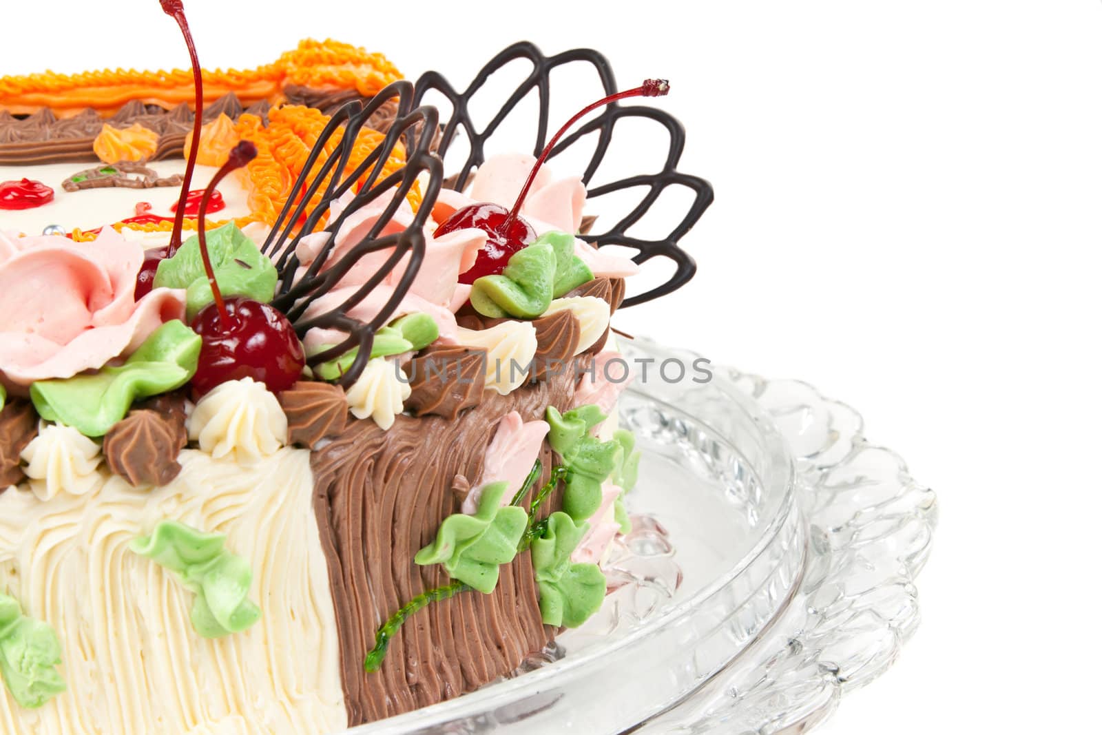 cream cake with cherries isolated on a white background