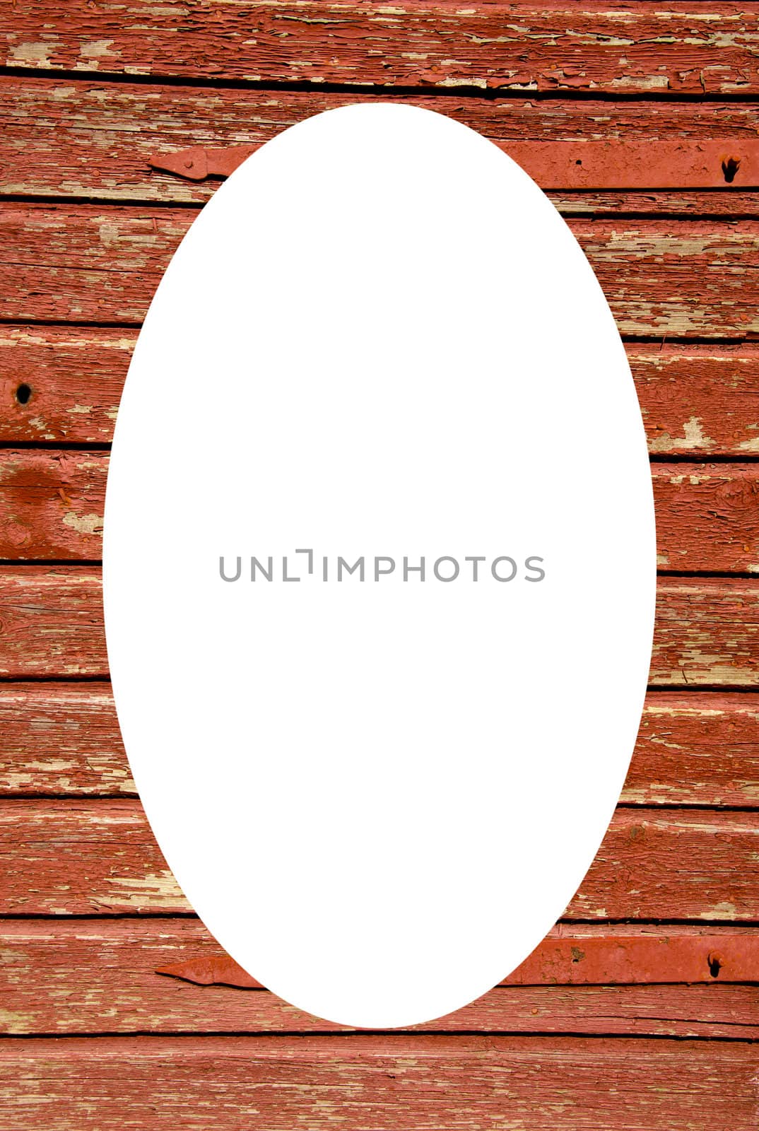 Old wooden building wall and white oval in center by sauletas