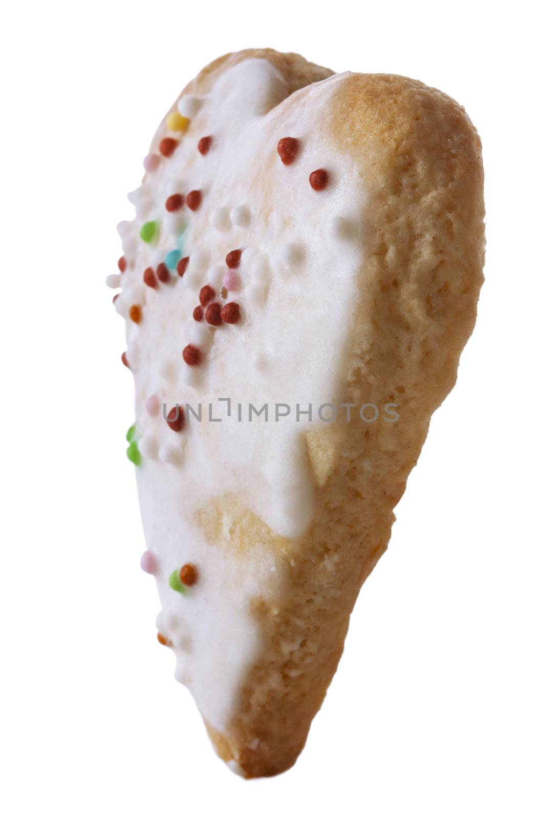 Image of a specific winter Alsatian heart-shaped biscuit in a vertical position isolated against a white background.