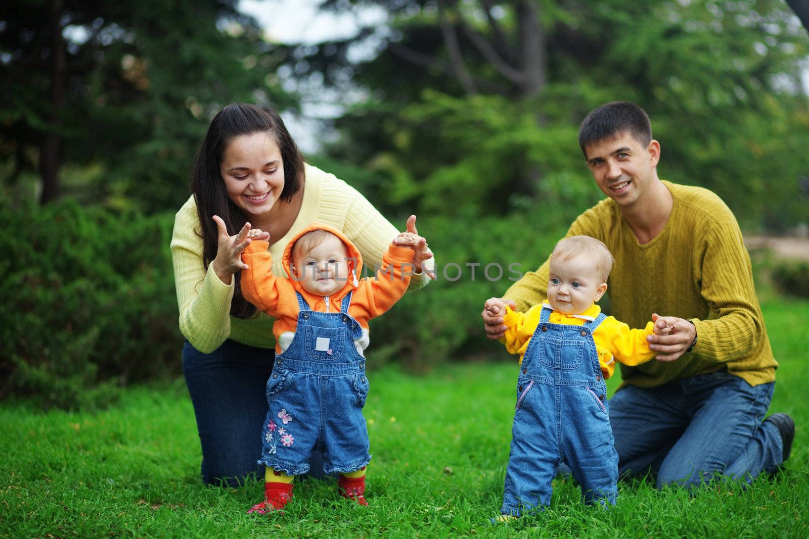 Happy parents with twins by alenkasm