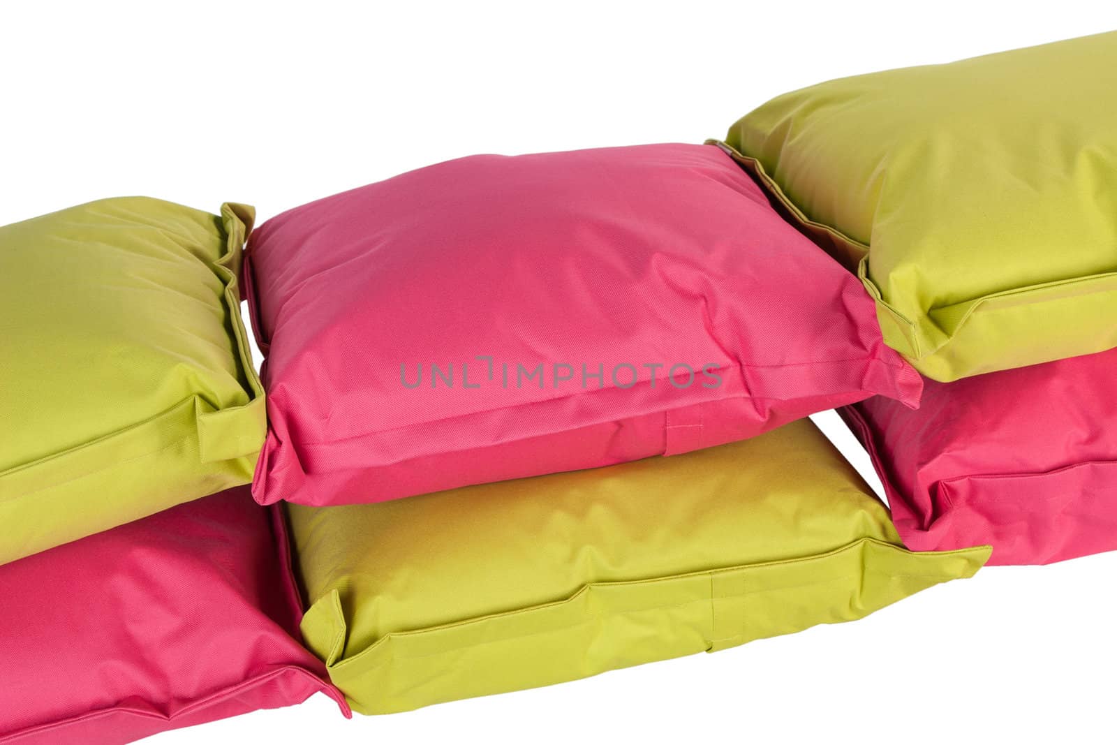 bright pink and green pillows isolated on white