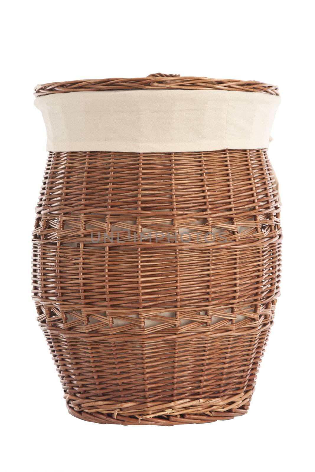 Isolated on white laundry basket made of rattan