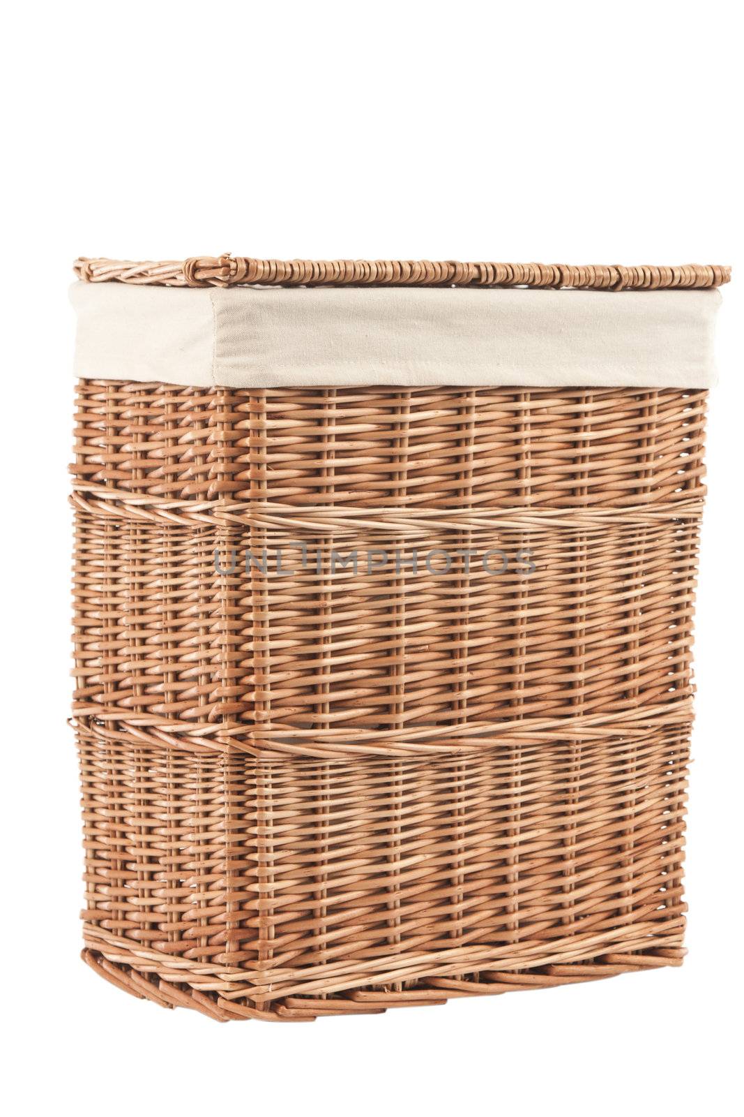 Isolated on white laundry basket made of rattan