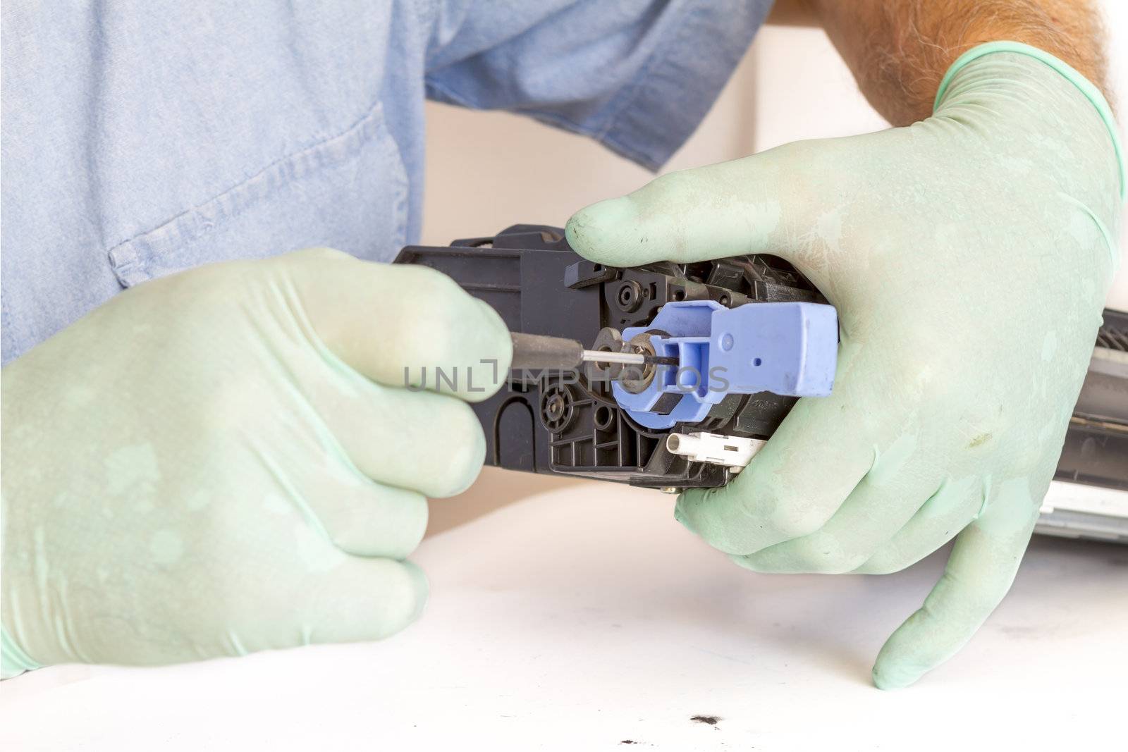 worker Laser printer on a workbench. Printer workshop