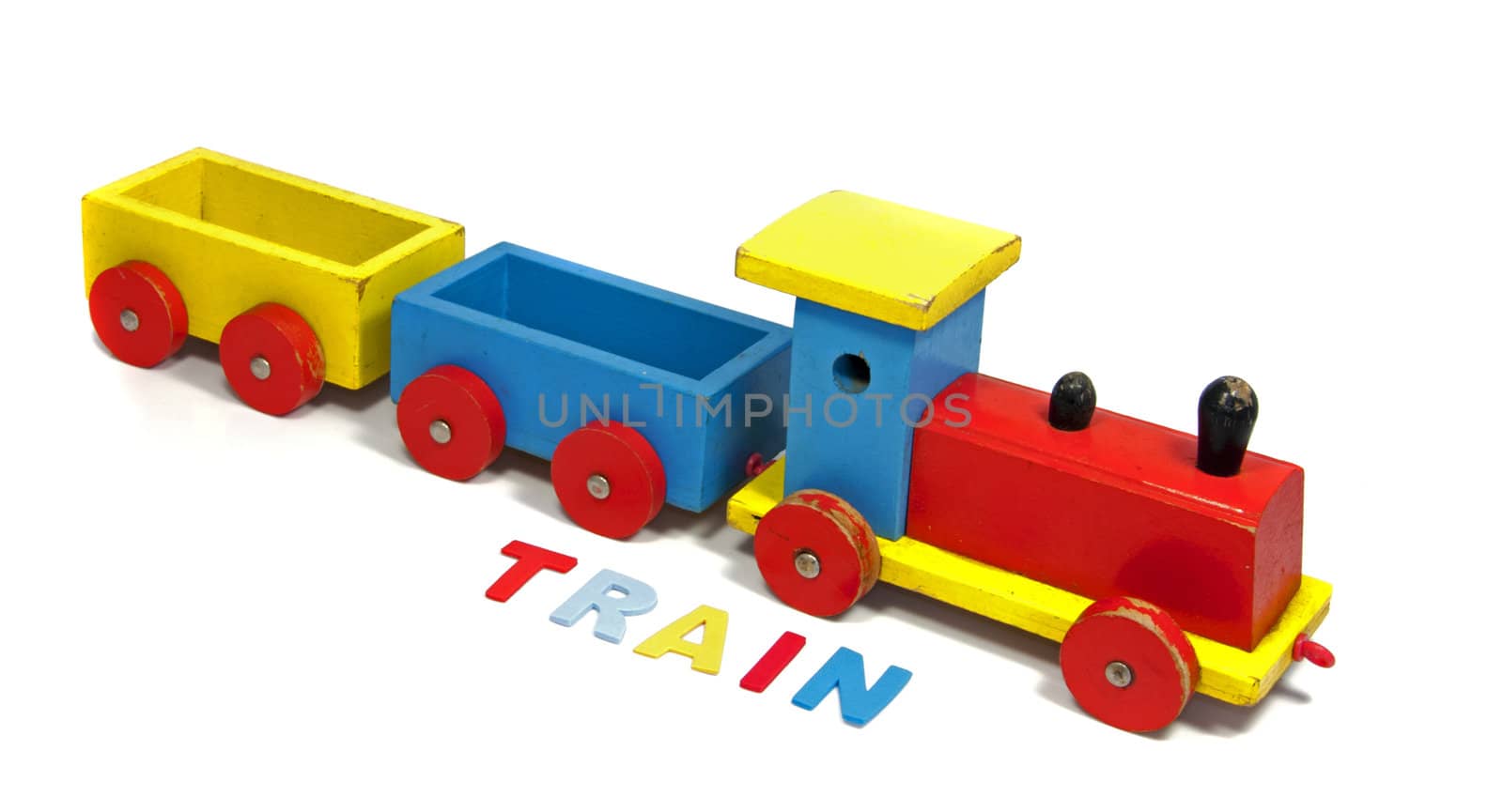wooden train with letters by compuinfoto