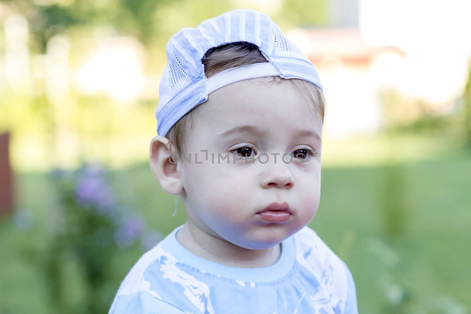 Nine months old little boy portrait. Caucasian descent.