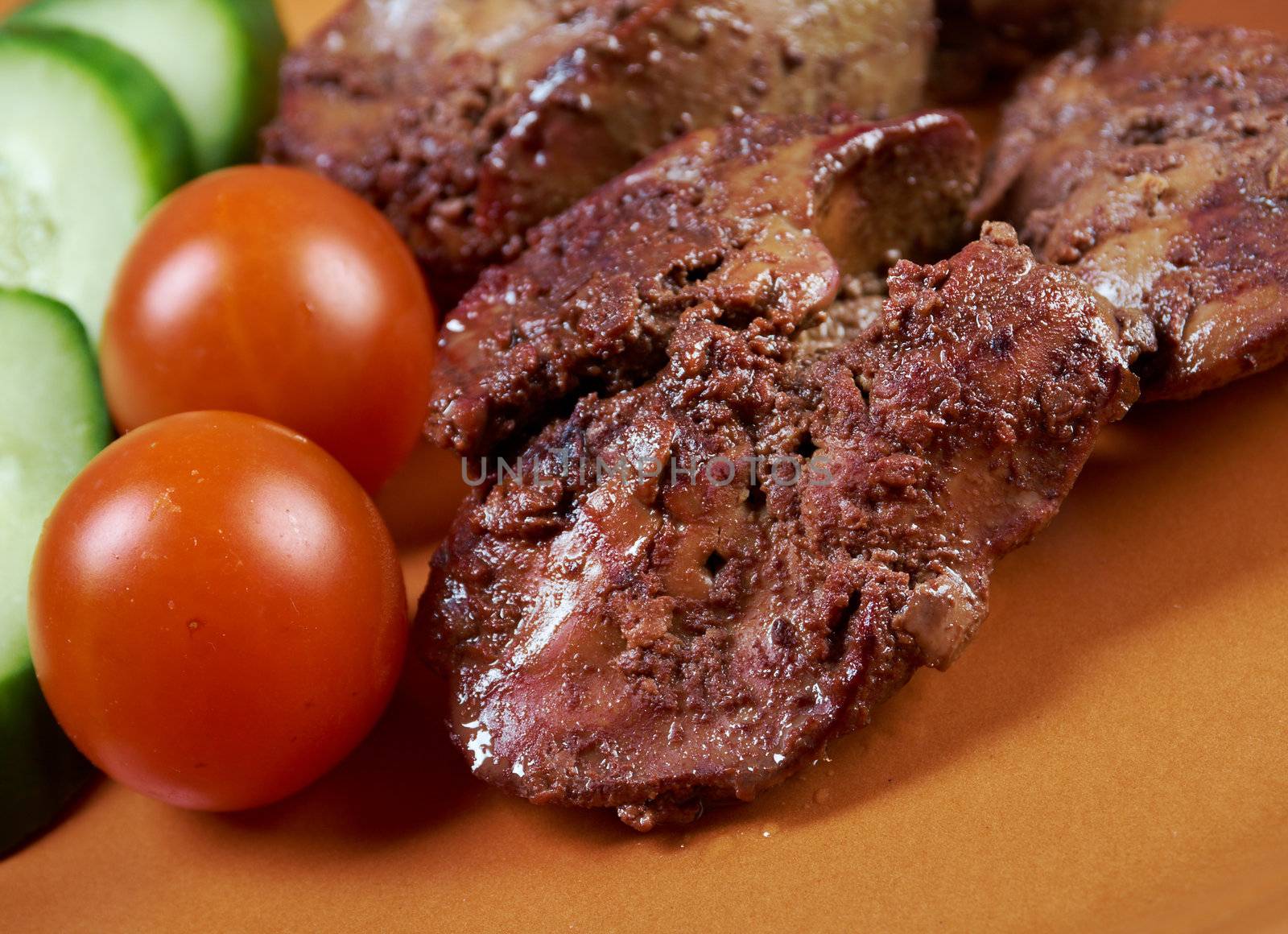 Chicken livers and vegetable.closeup