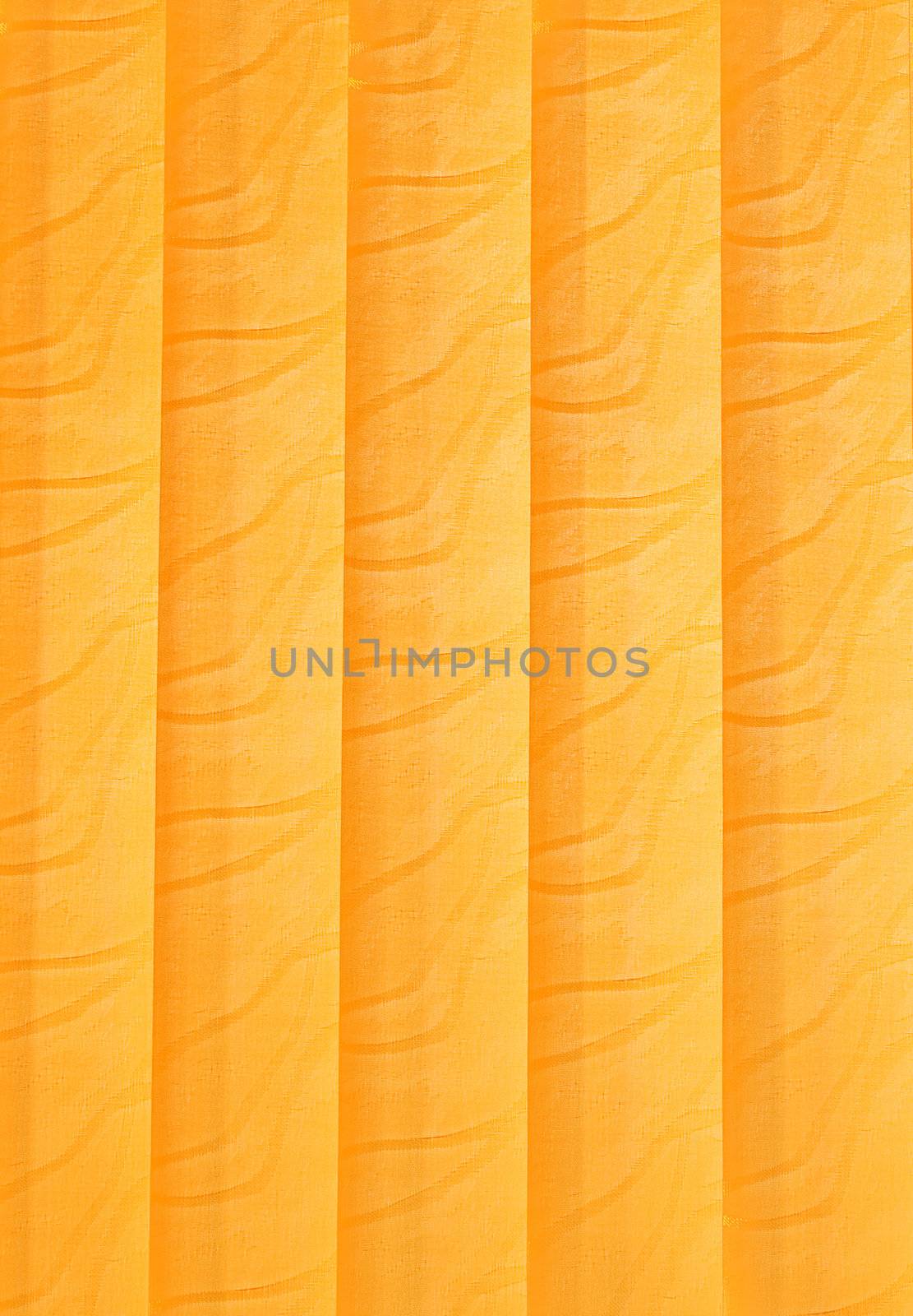 Orange vertical jalousie made of cloth. Background