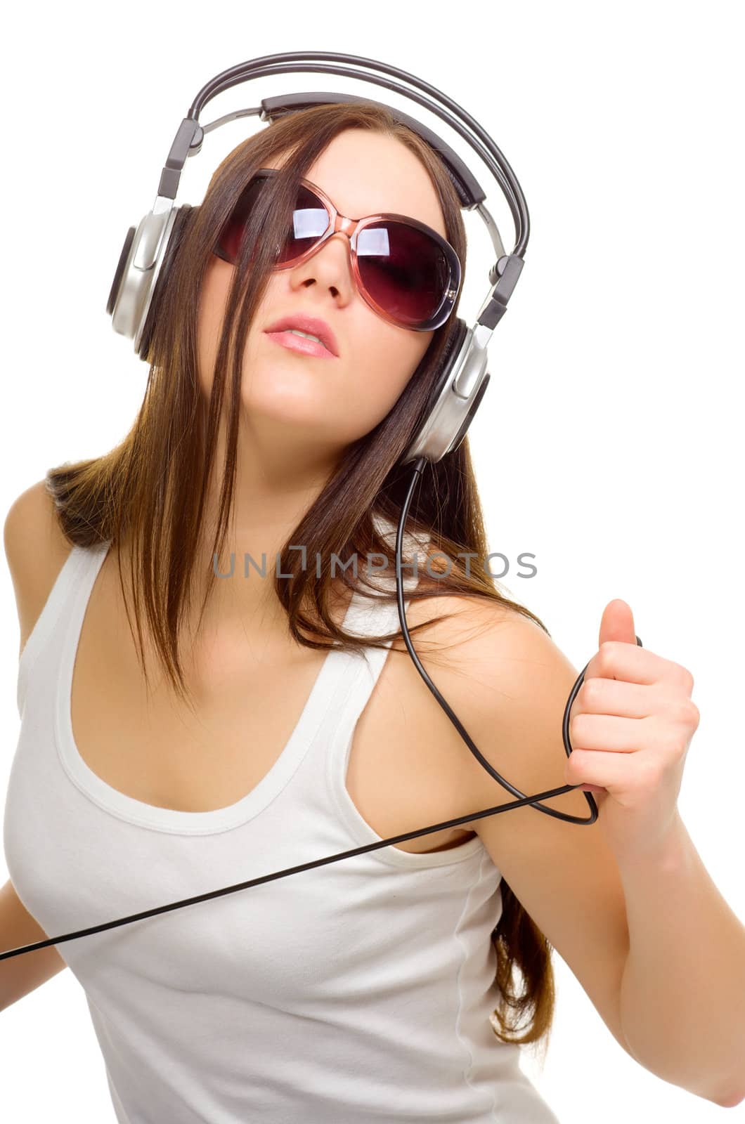 Young girl with headphones isolated