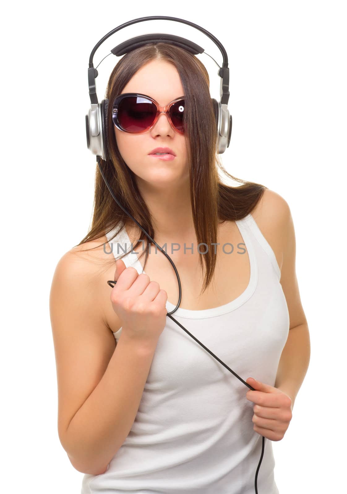 Young girl with headphones isolated