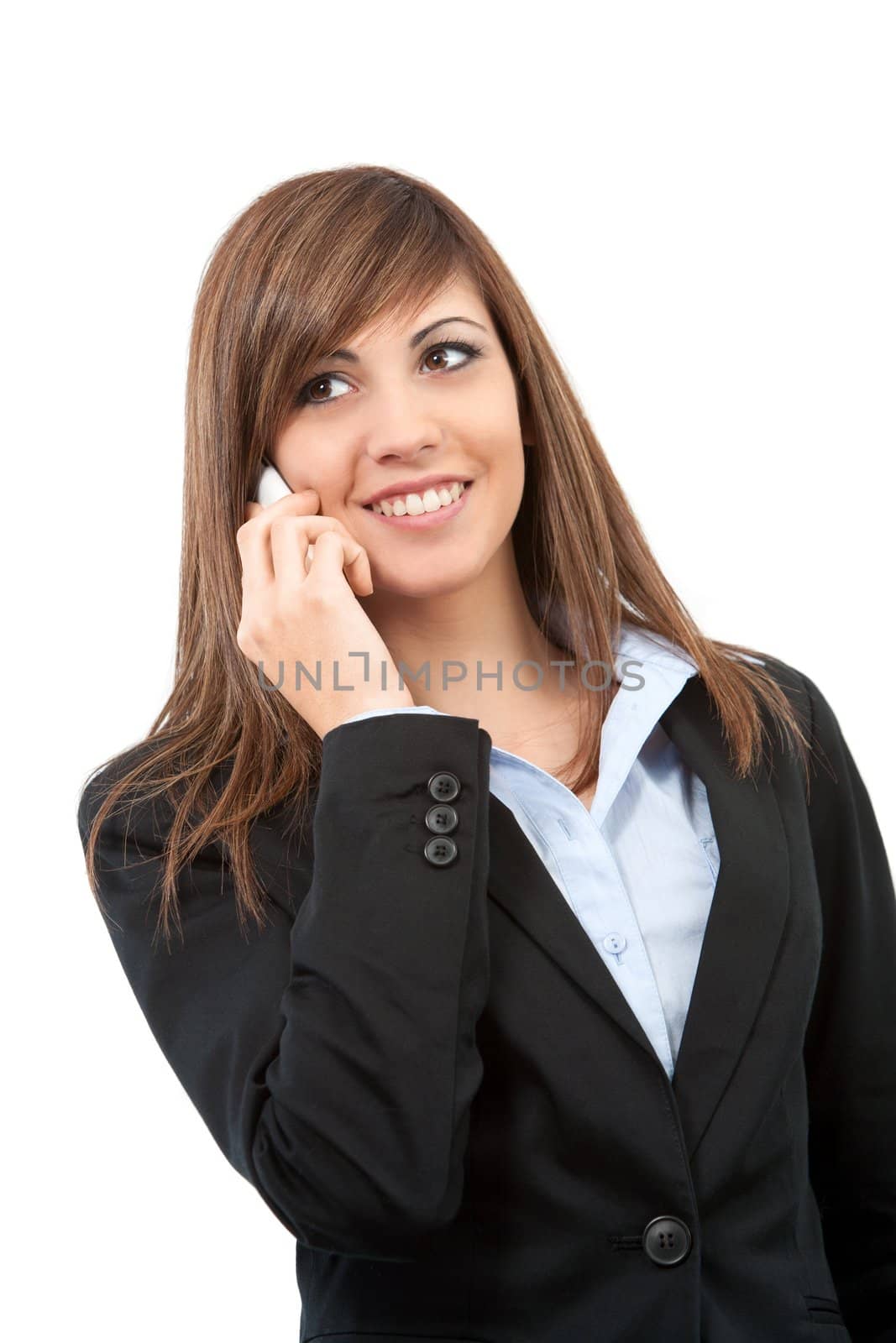 Portrait of Attractive young business woman talking on cell phone. Isolated on white.