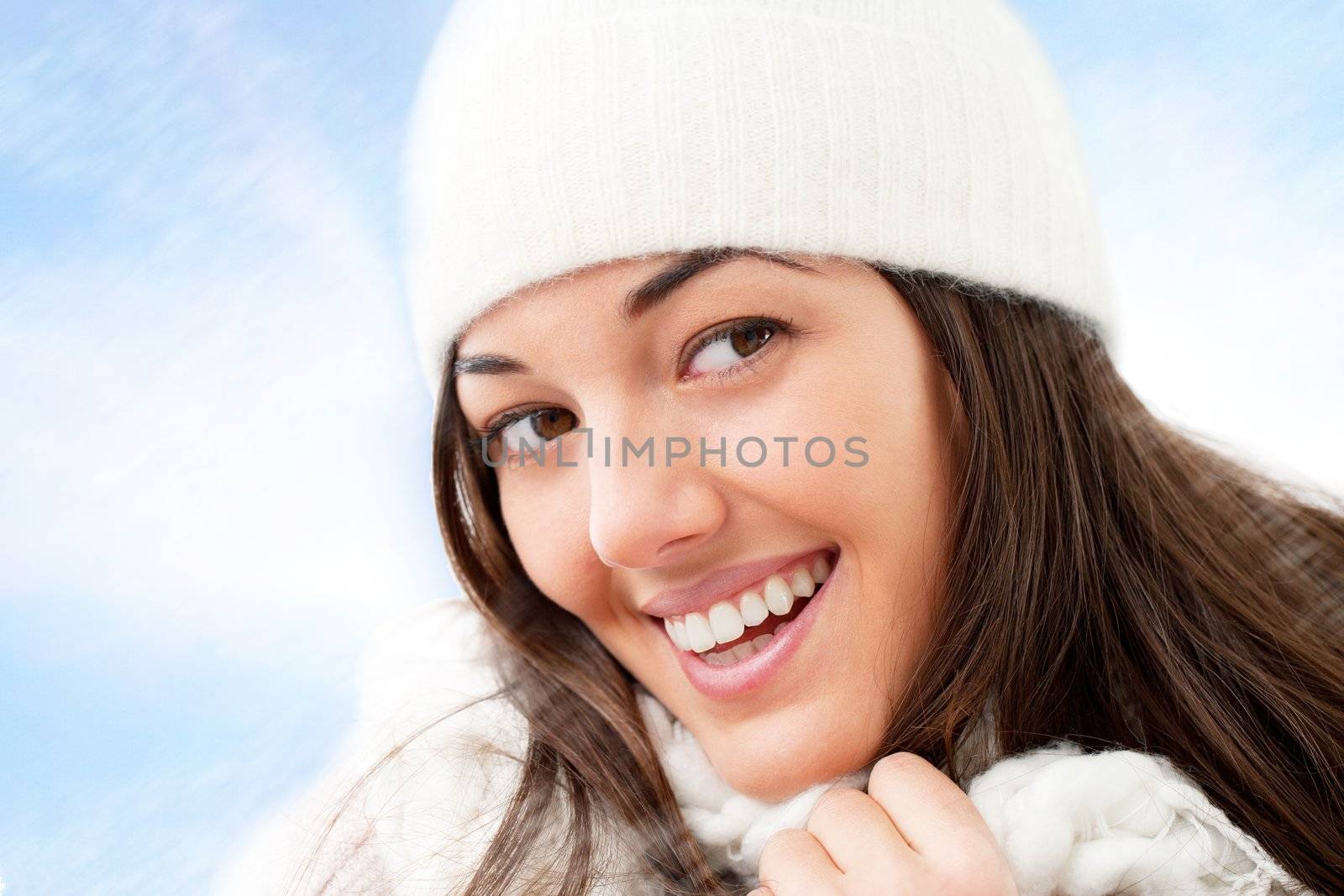 Close up of winter girl with attractive smile.