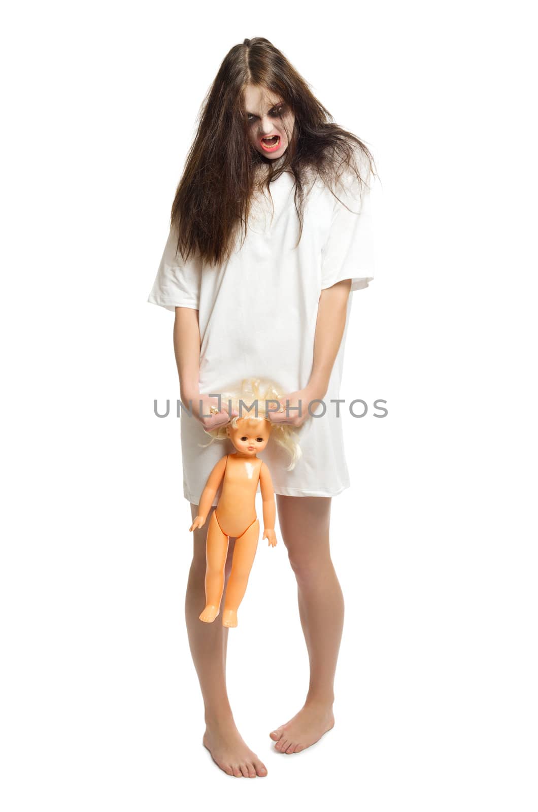 Zombie girl with plastic doll isolated