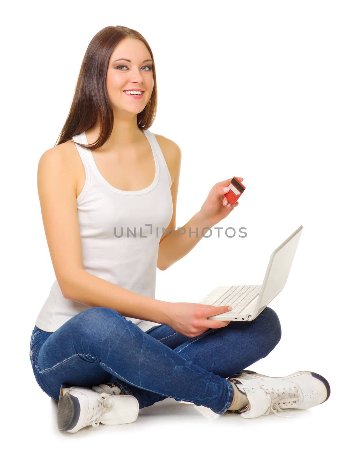 Young girl with laptop and credit card by rbv