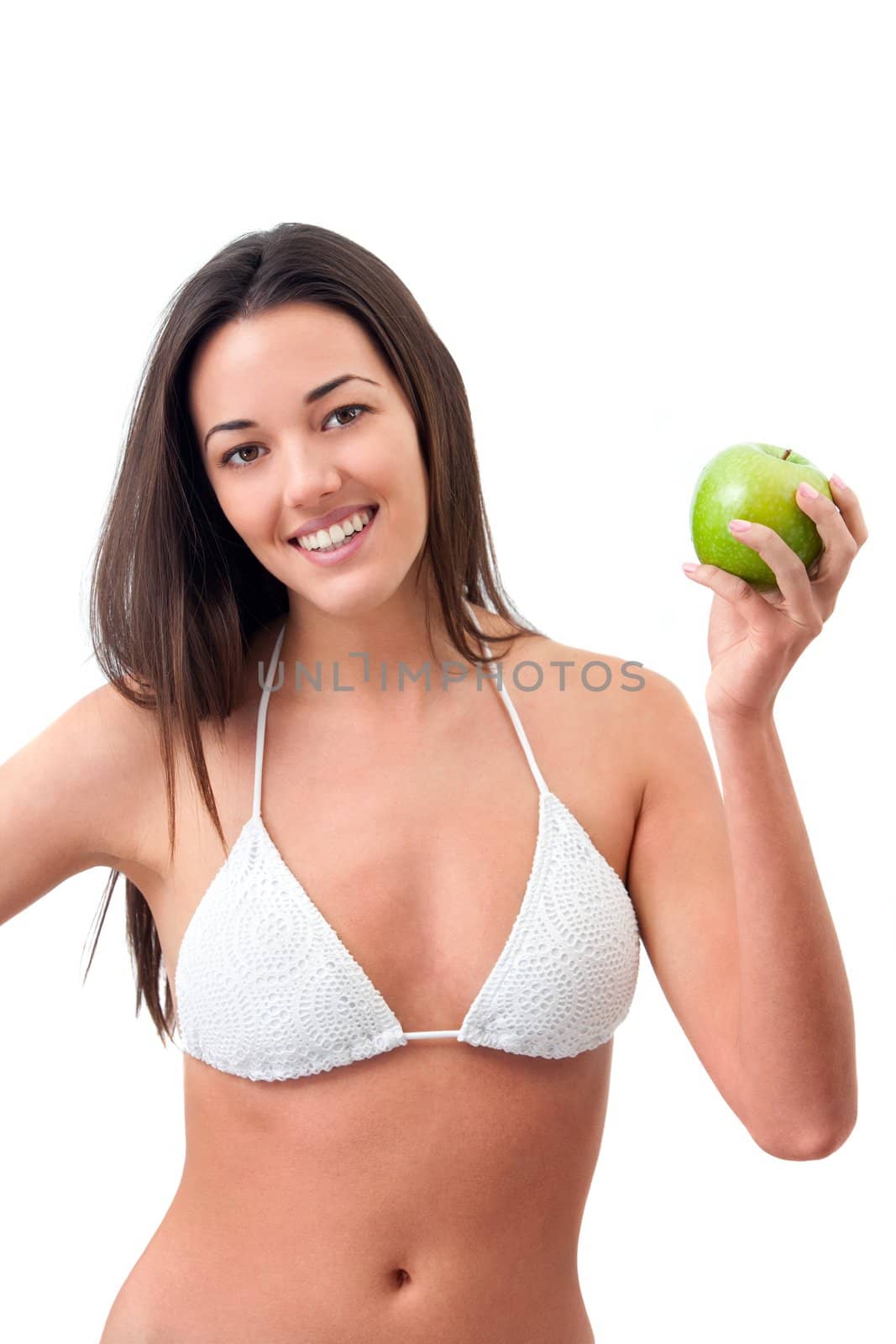 Young attractive woman holding green apple.Isolated