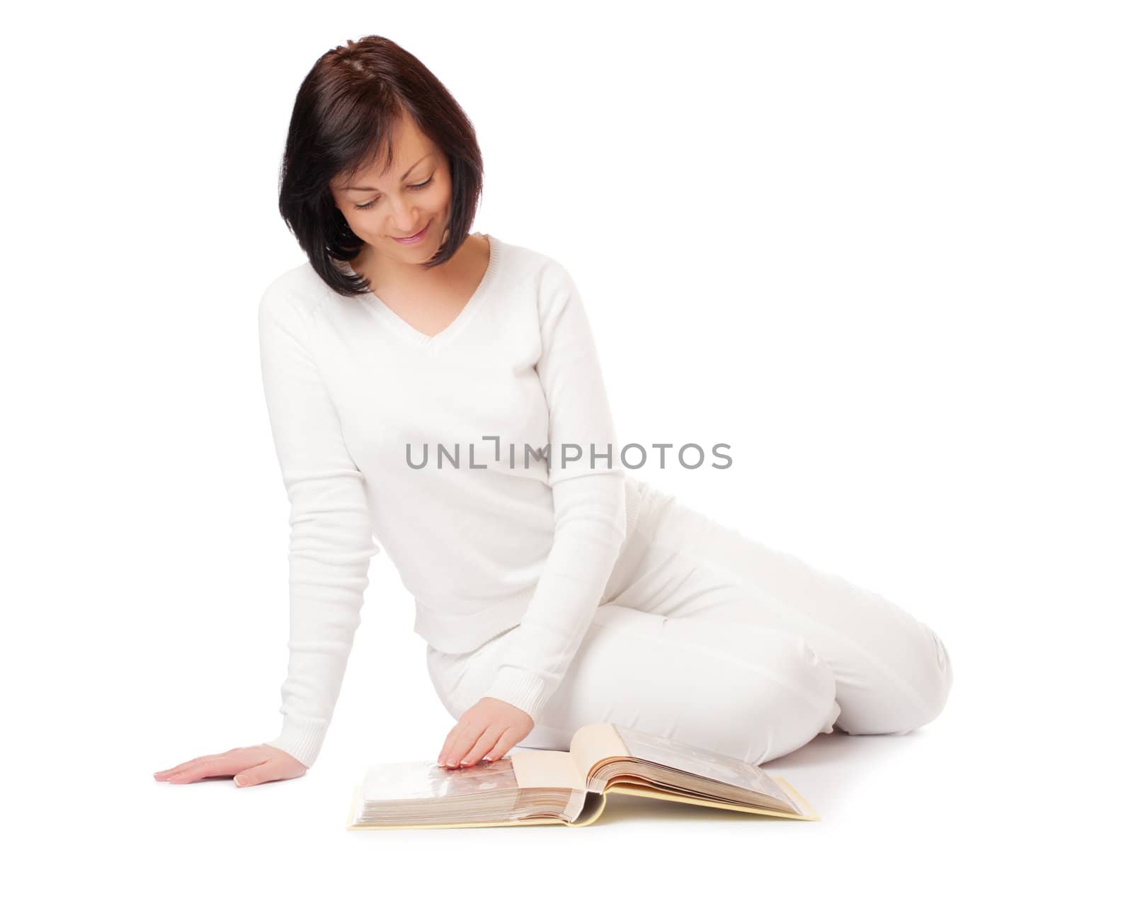 Young smiling woman looking album isolated