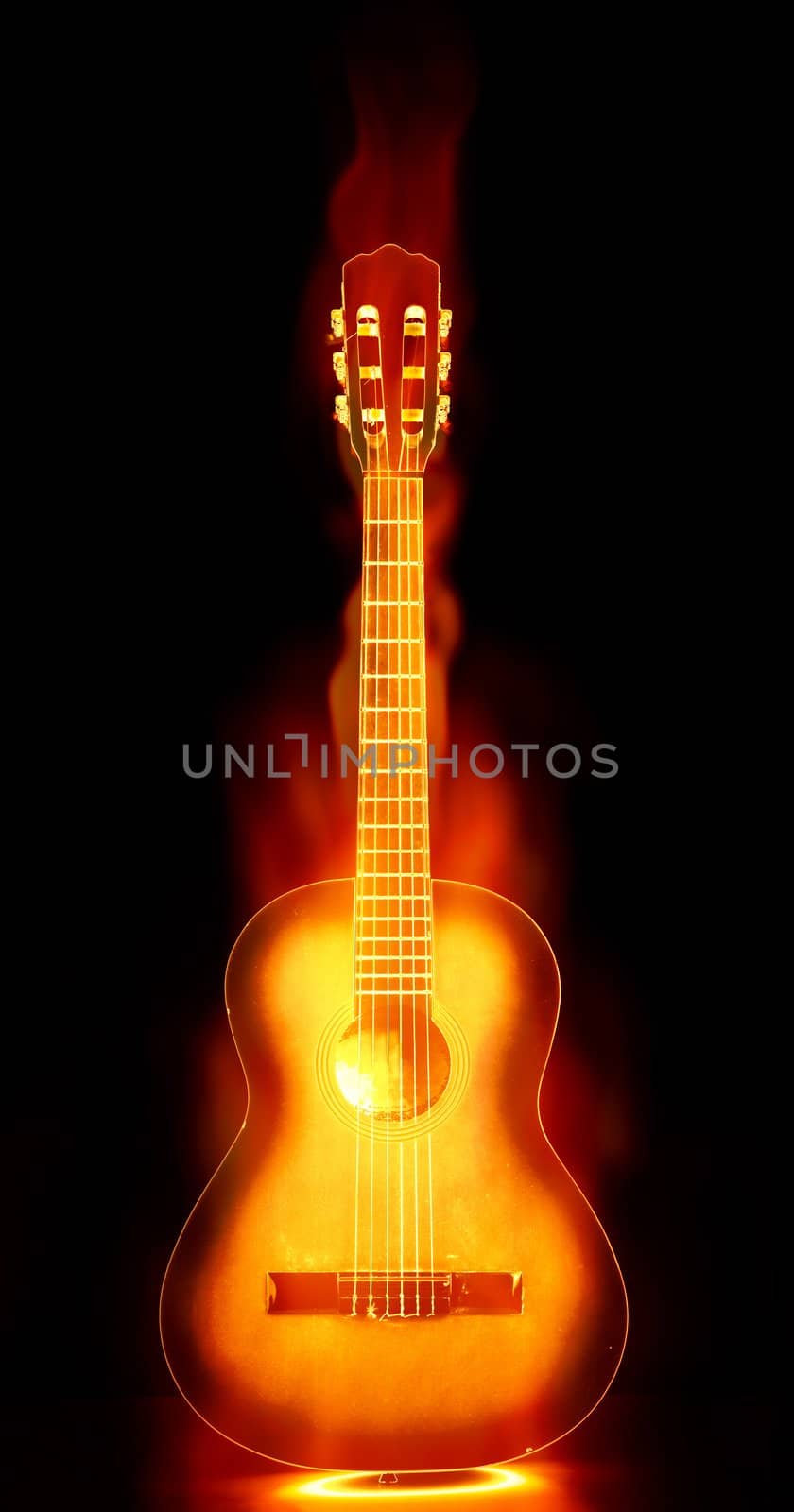 image of an acoustic guitar on fire