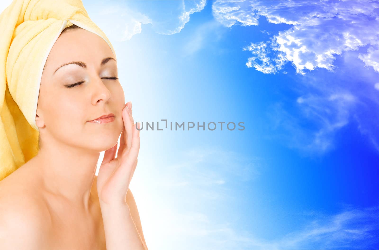 Young woman getting ready for the spa treatment on blue sky background