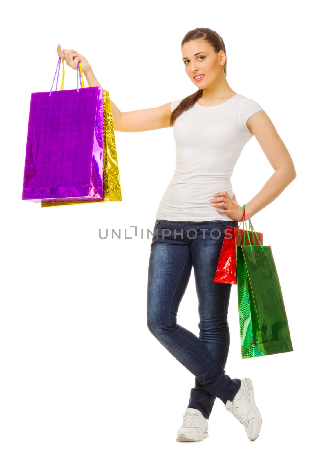Young smiling girl with bags isolated