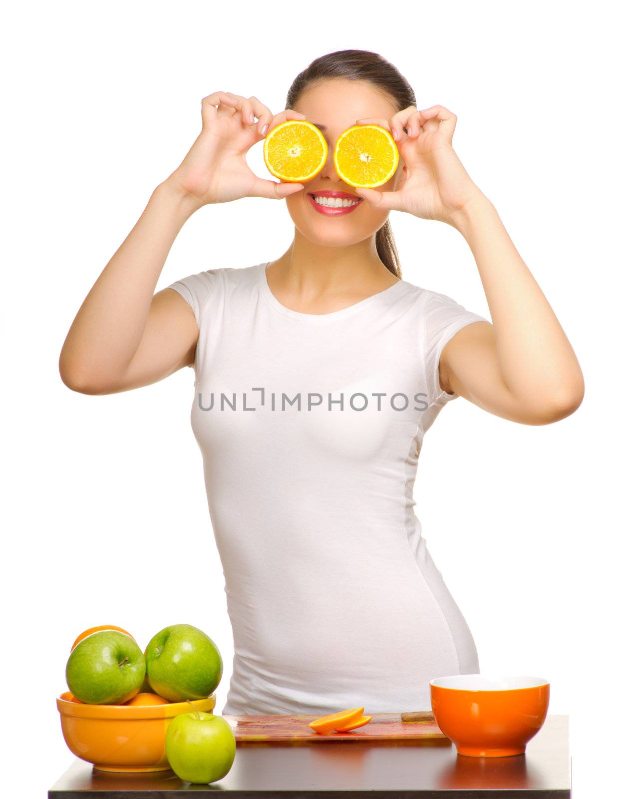 Young girl with orange slices isolated