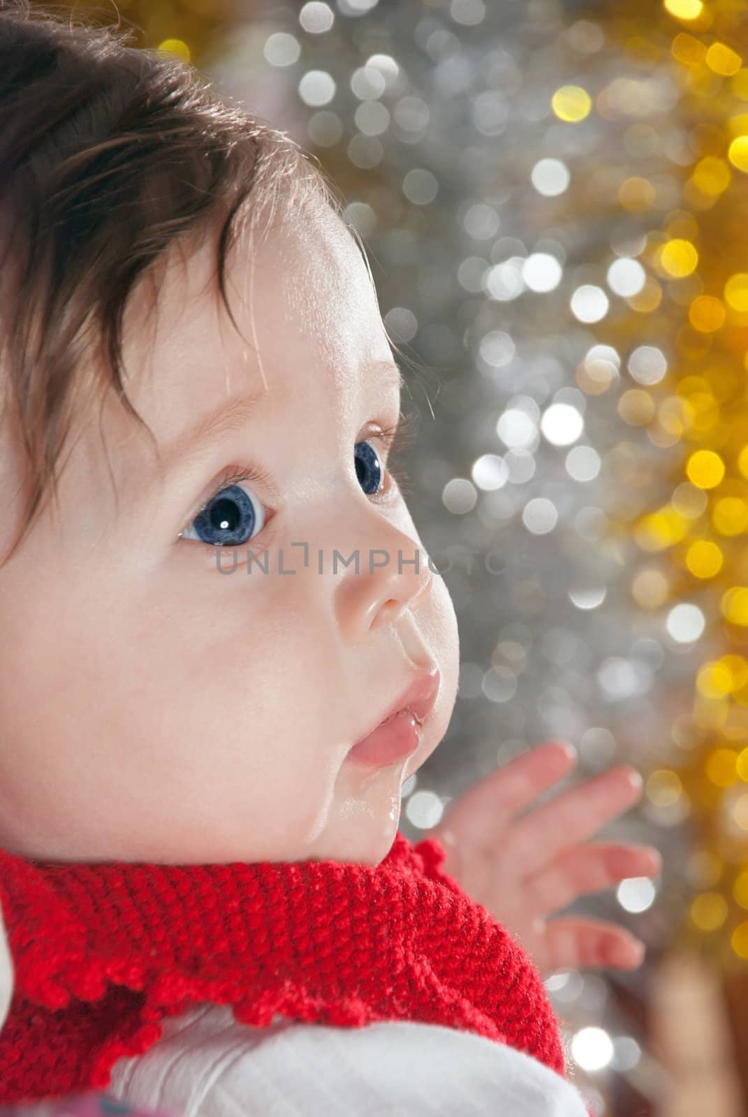 Close-up portrait of a young boy on art background.