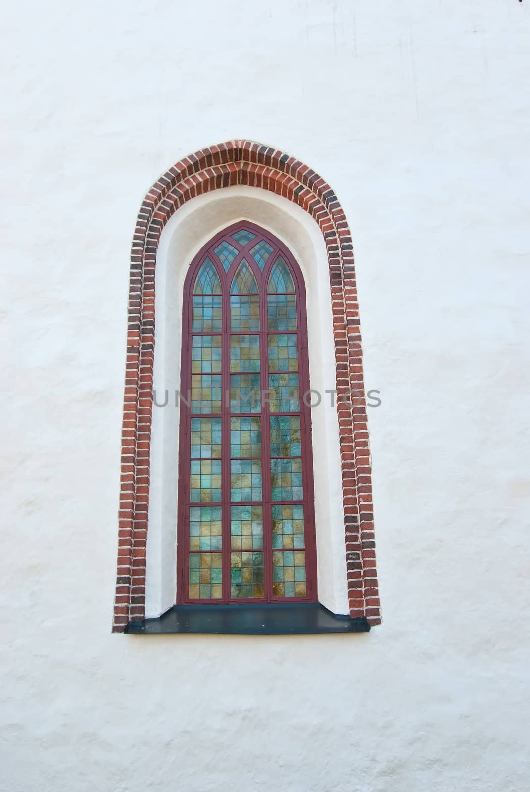 The window in the wall of an old fortress on the island of Suomenlinna.