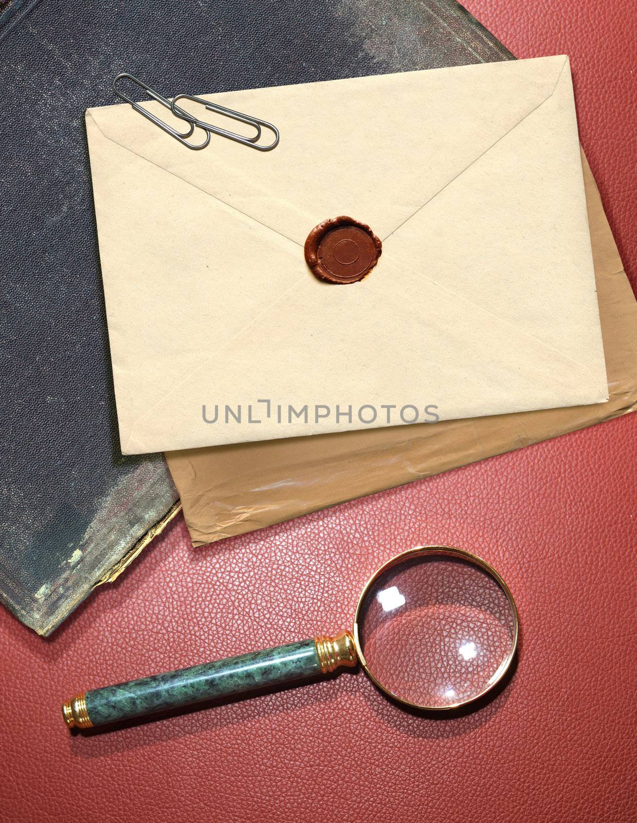 dorsal view of military top secret envelope with magnifier