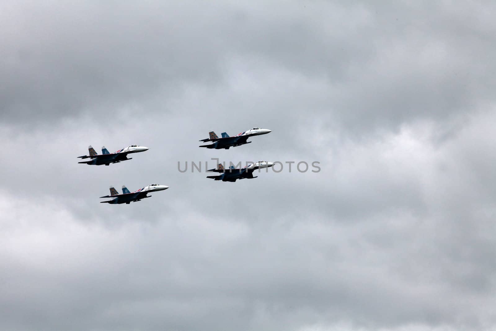 Aerobatic team "Russian Knights" on the Su-27 performs aerobatics demonstration