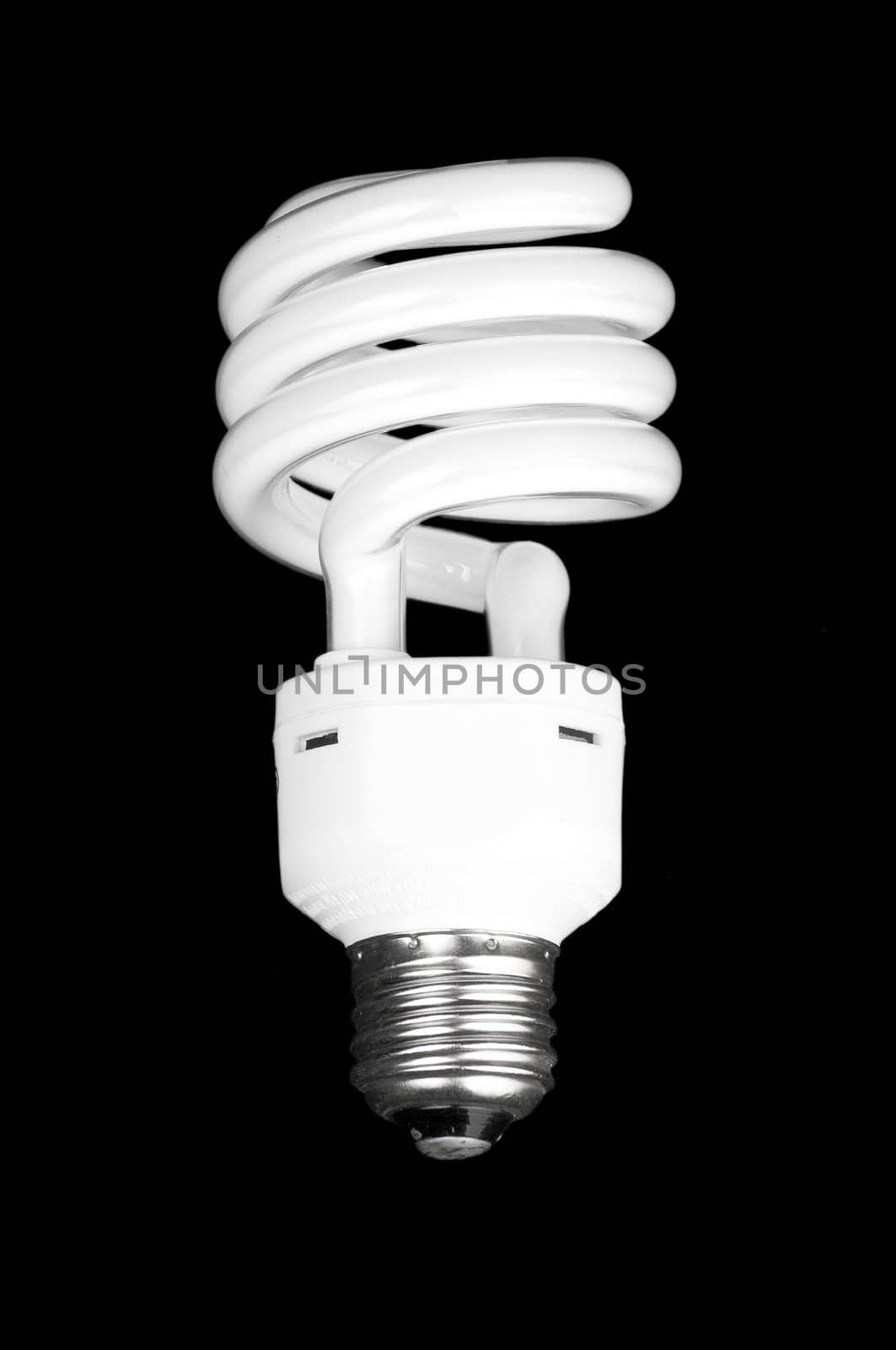 White light bulb on black background. by Shane9