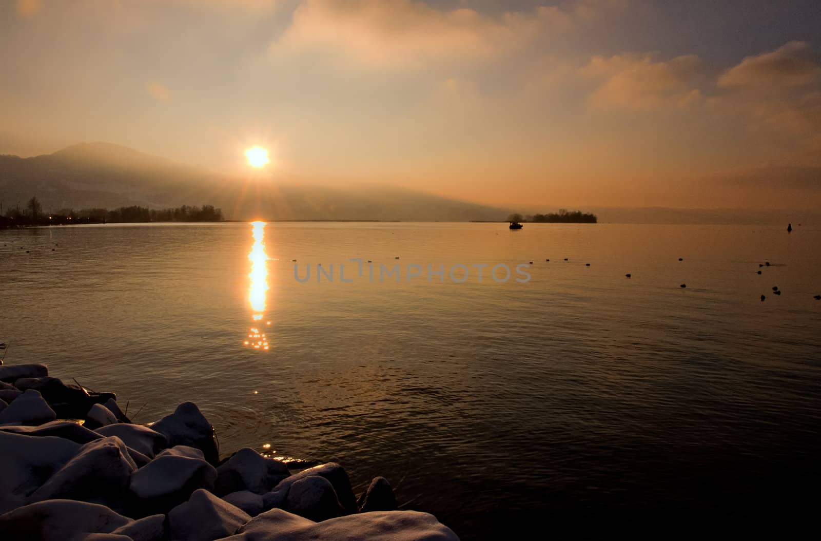 Pier with snow, lake view. by jmffotos