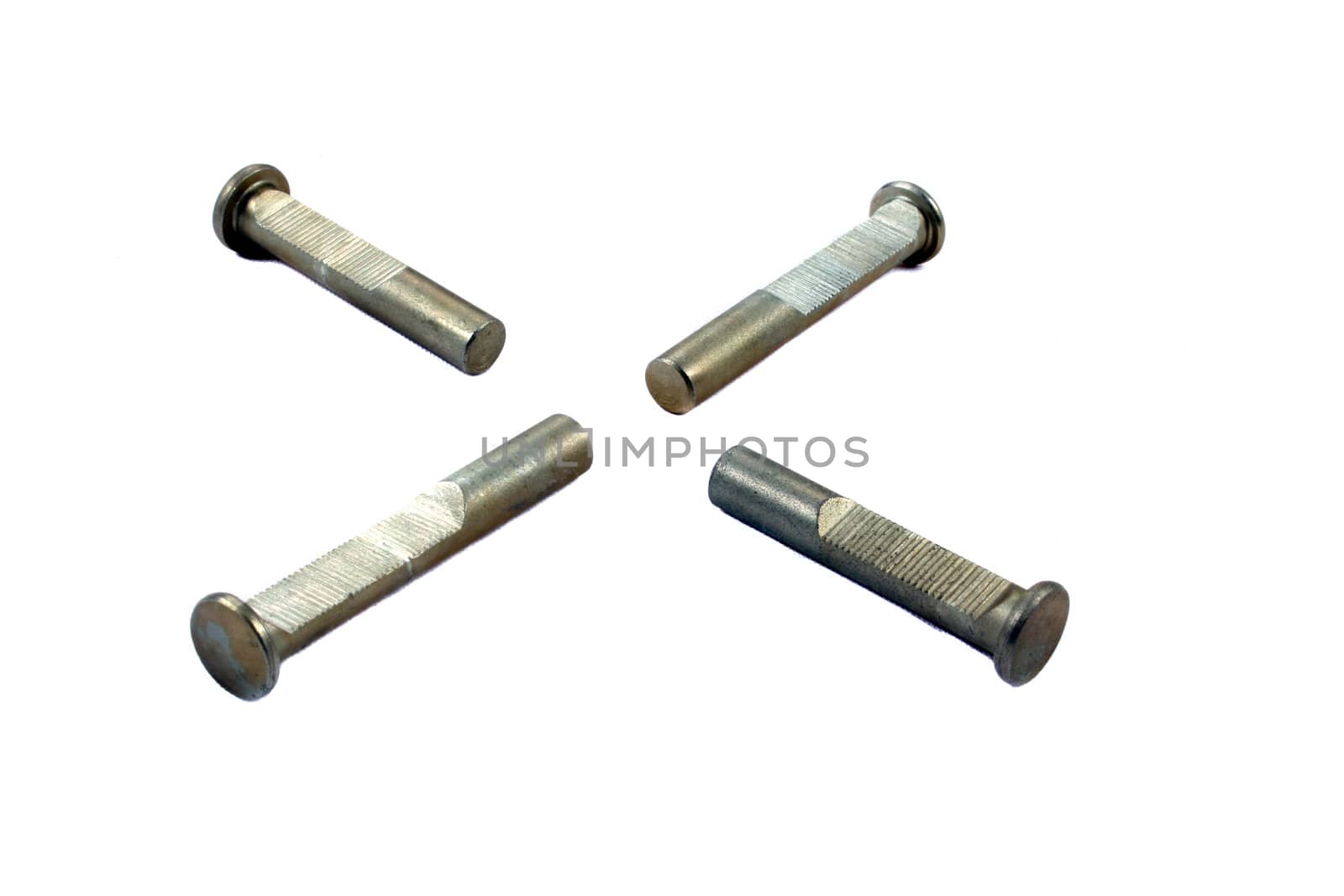 A set of screws / broaches used in an engine of a vehicle, on white studio background.